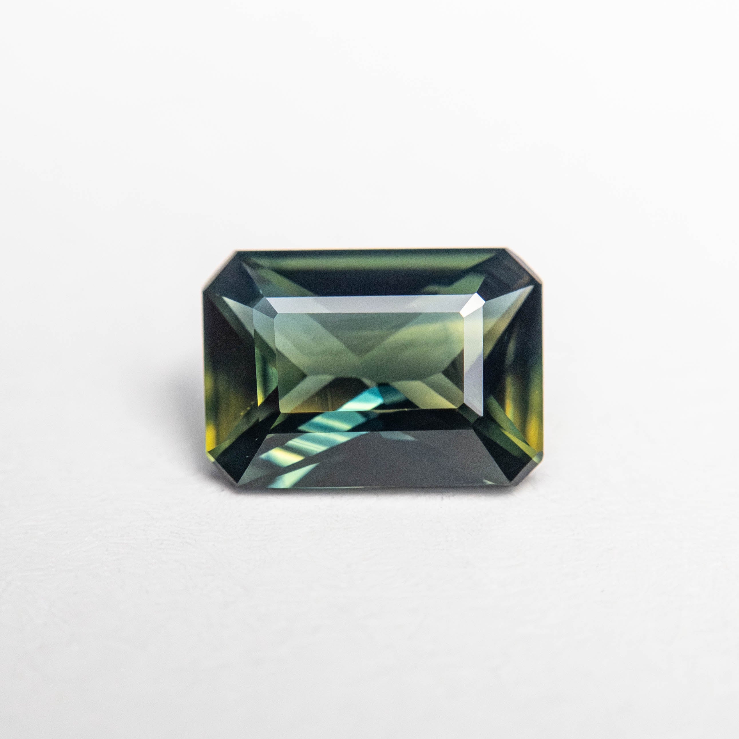 0.93ct Parti Blue-Green Cut Corner Rectangle Step Cut Sapphire - Lelya - bespoke engagement and wedding rings made in Scotland, UK