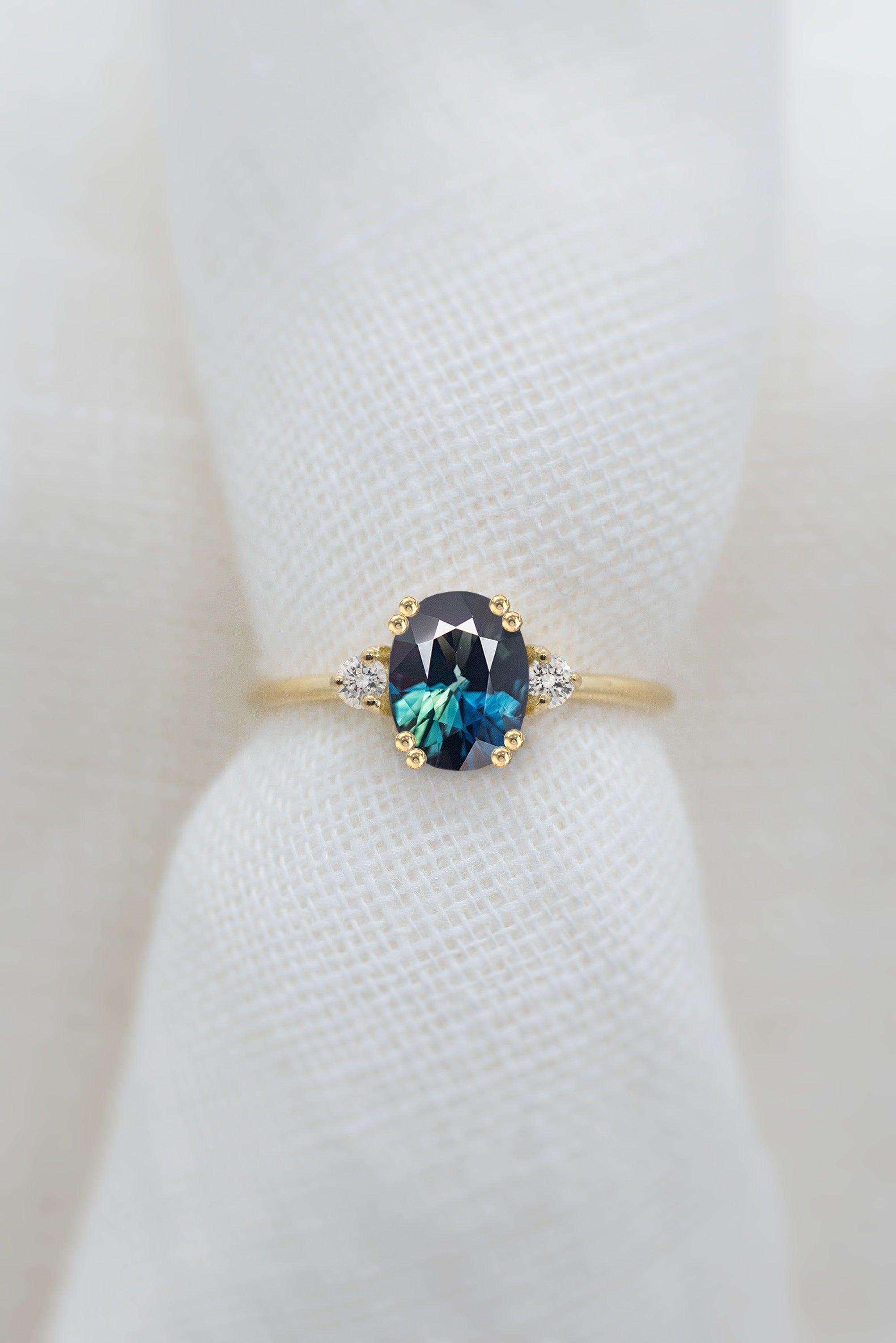 1.79ct Teal Oval Brilliant Sapphire - Lelya - bespoke engagement and wedding rings made in Scotland, UK