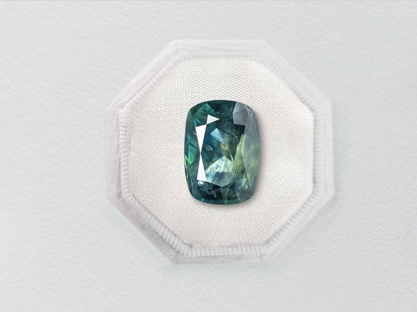 6.44ct Teal Blue Nebula Cushion Brilliant Sapphire - Lelya - bespoke engagement and wedding rings made in Scotland, UK