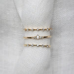 Wee Light Salt and Pepper Pear Diamond Ripple Band - Lelya - bespoke engagement and wedding rings made in Scotland, UK