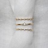 Wee Light Salt and Pepper Pear Diamond Ripple Band - Lelya - bespoke engagement and wedding rings made in Scotland, UK