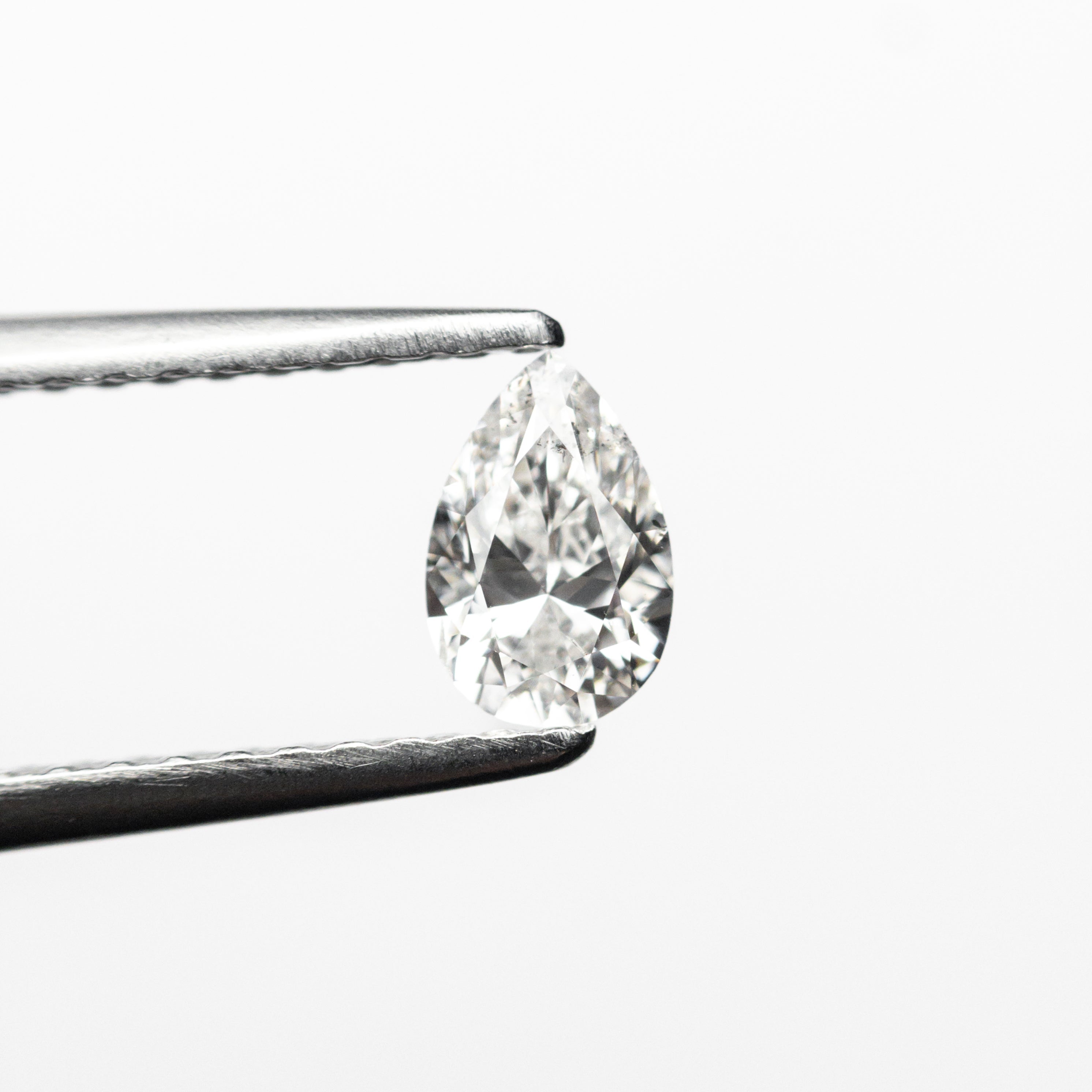 0.30ct 5.58x3.66x2.33mm SI2 E Pear Brilliant 19438 - 24 - Lelya - bespoke engagement and wedding rings made in Scotland, UK