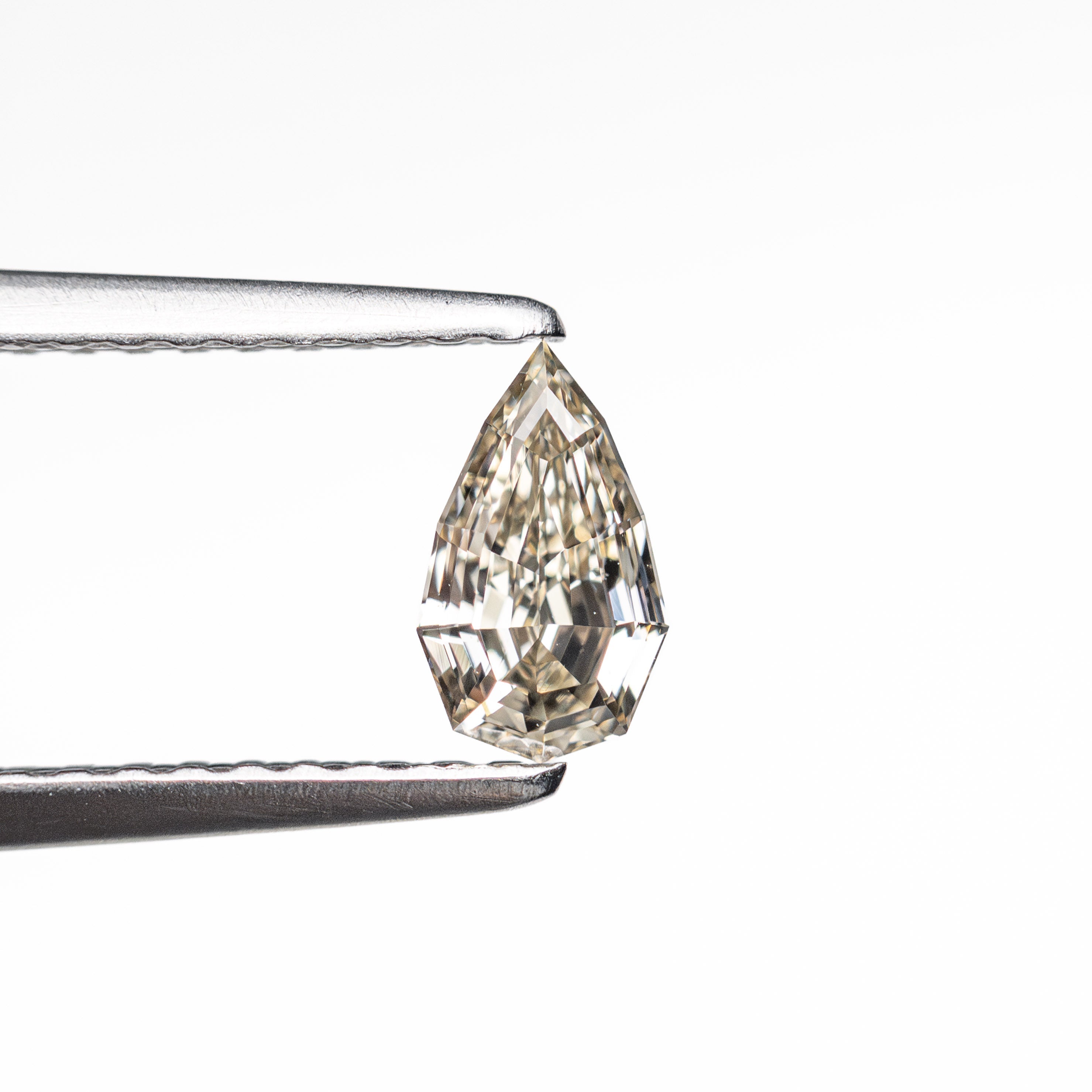 0.30ct 6.29x3.55x2.13mm SI1 C3 Geo Pear Step Cut 🇿🇦 26109 - 19 - Lelya - bespoke engagement and wedding rings made in Scotland, UK