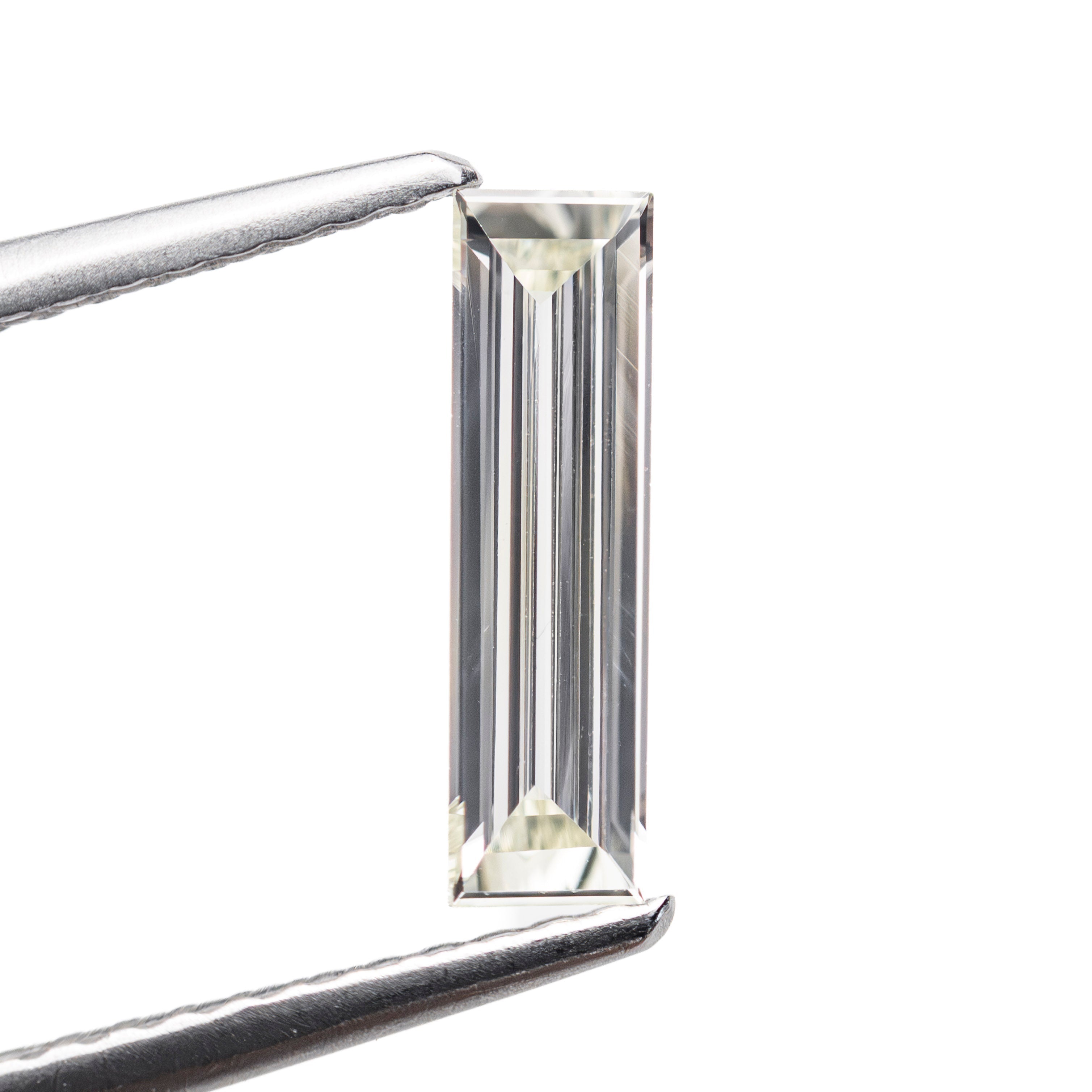 0.45ct 10.50x2.98x1.42mm VS2 Q - R Baguette Step Cut 27911 - 01 - Lelya - bespoke engagement and wedding rings made in Scotland, UK