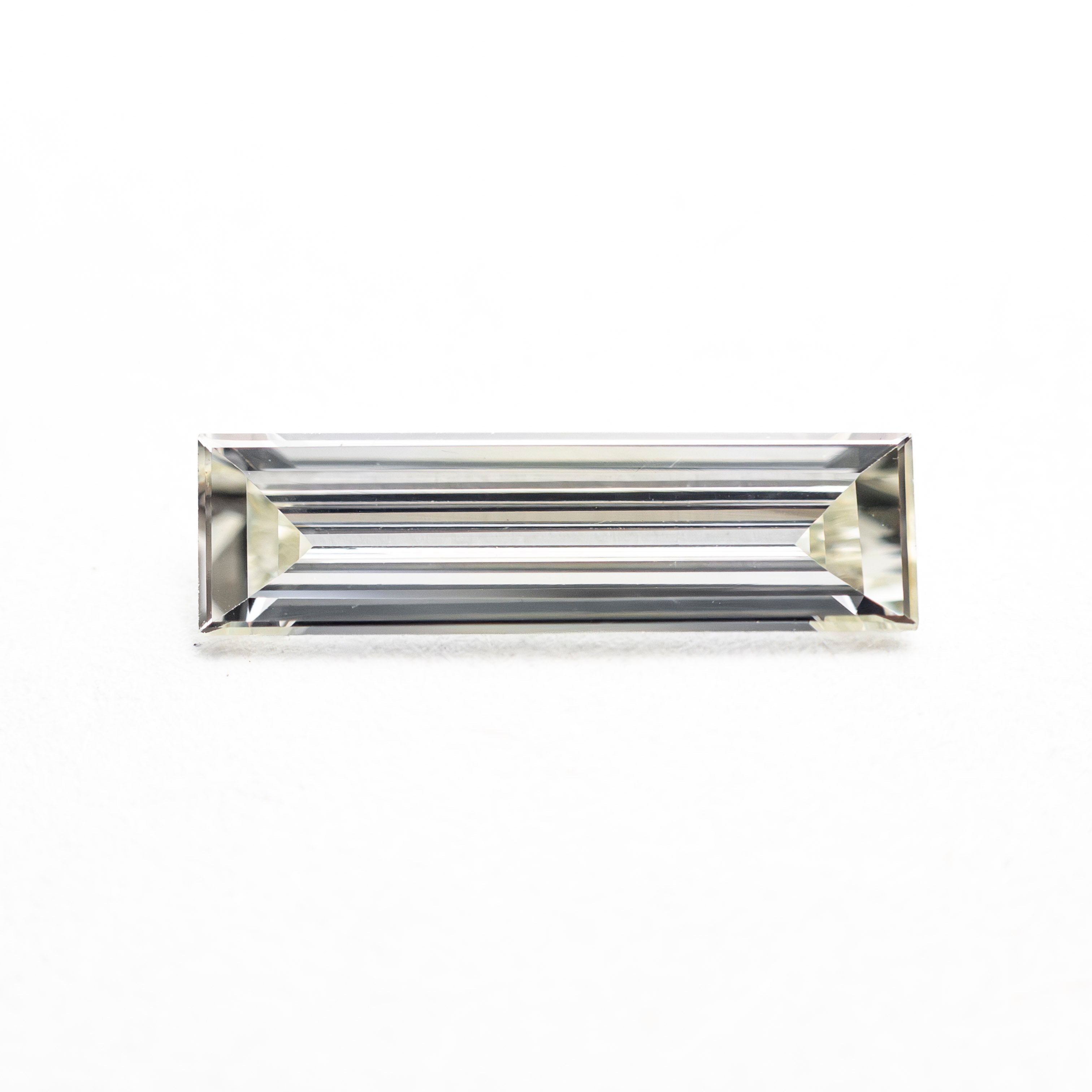 0.45ct 10.50x2.98x1.42mm VS2 Q - R Baguette Step Cut 27911 - 01 - Lelya - bespoke engagement and wedding rings made in Scotland, UK