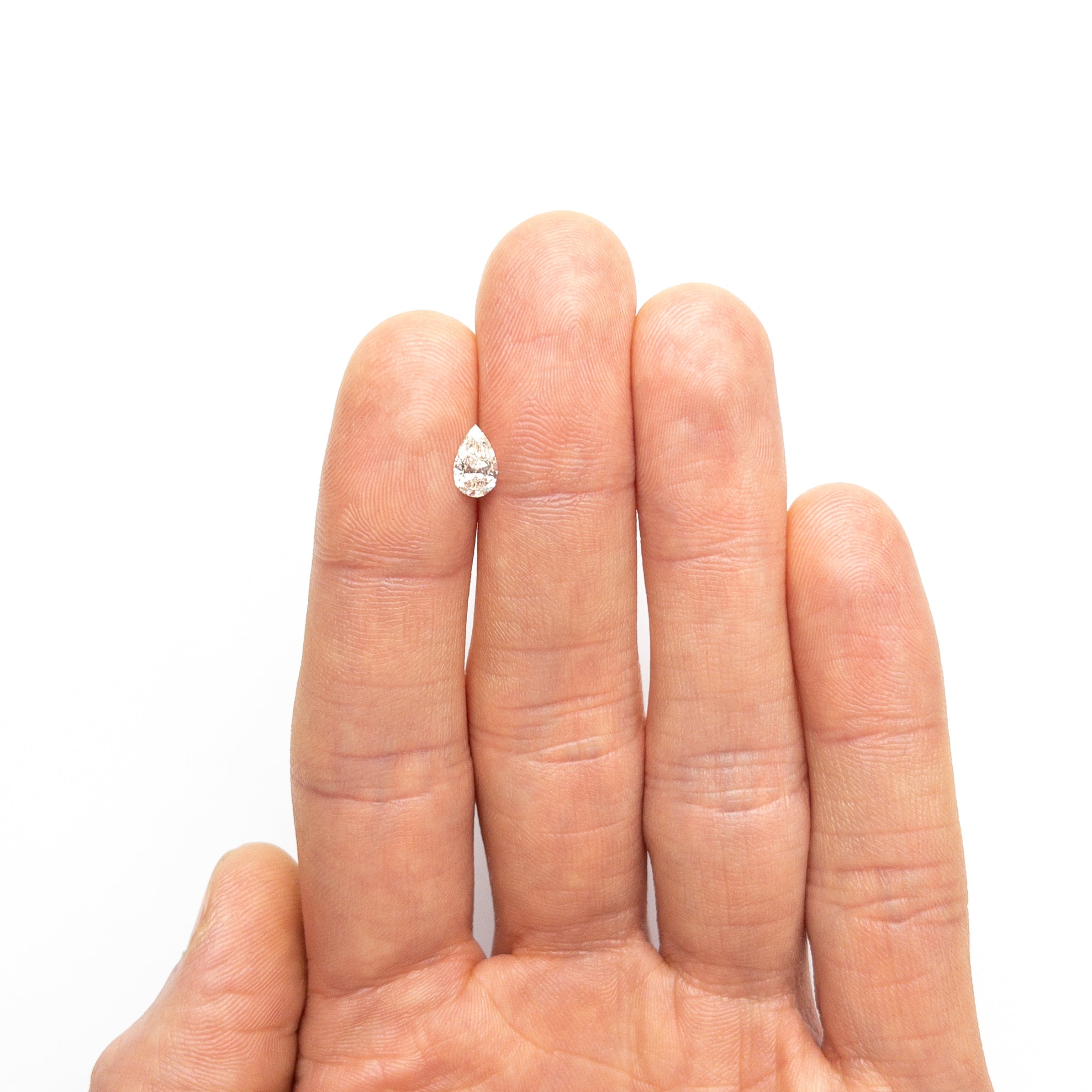 0.50ct 7.53x4.51x2.46mm VS1 L Pear Brilliant 25794 - 03 - Lelya - bespoke engagement and wedding rings made in Scotland, UK