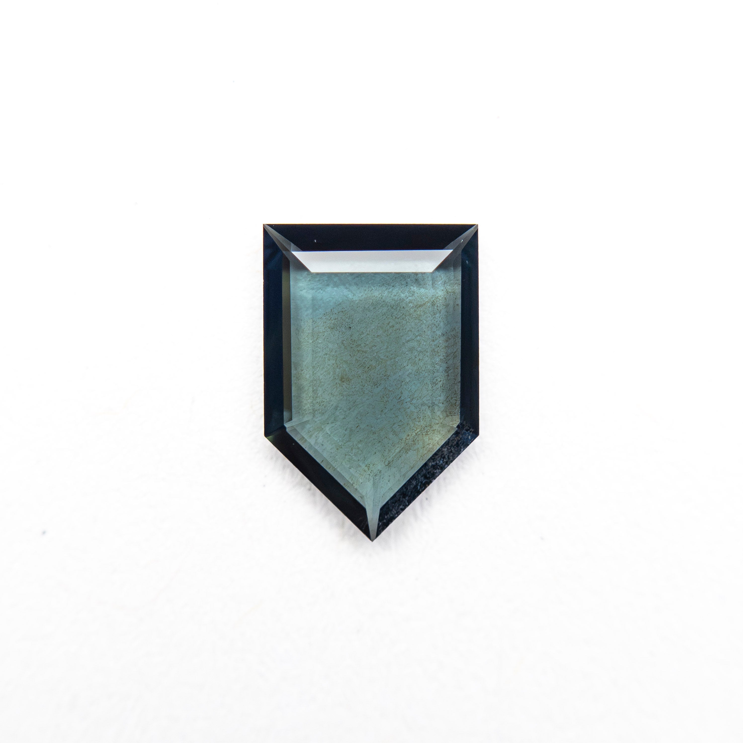0.52ct 7.07x4.78x1.25mm Shield Portrait Cut Sapphire 27730-07 - Lelya - bespoke engagement and wedding rings made in Scotland, UK