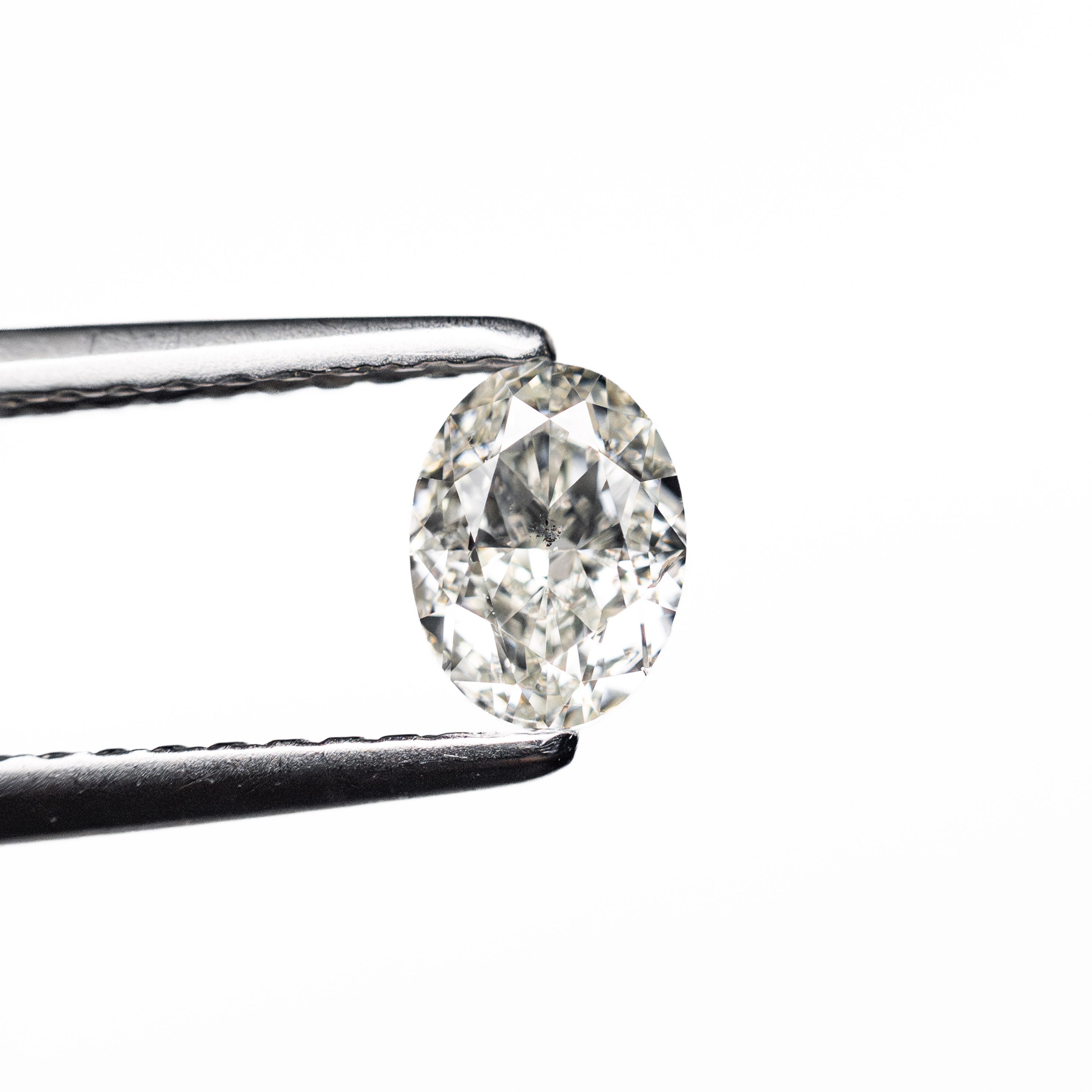 0.56ct 5.52x4.13x2.96mm SI1 I Oval Brilliant 27065 - 03 - Lelya - bespoke engagement and wedding rings made in Scotland, UK