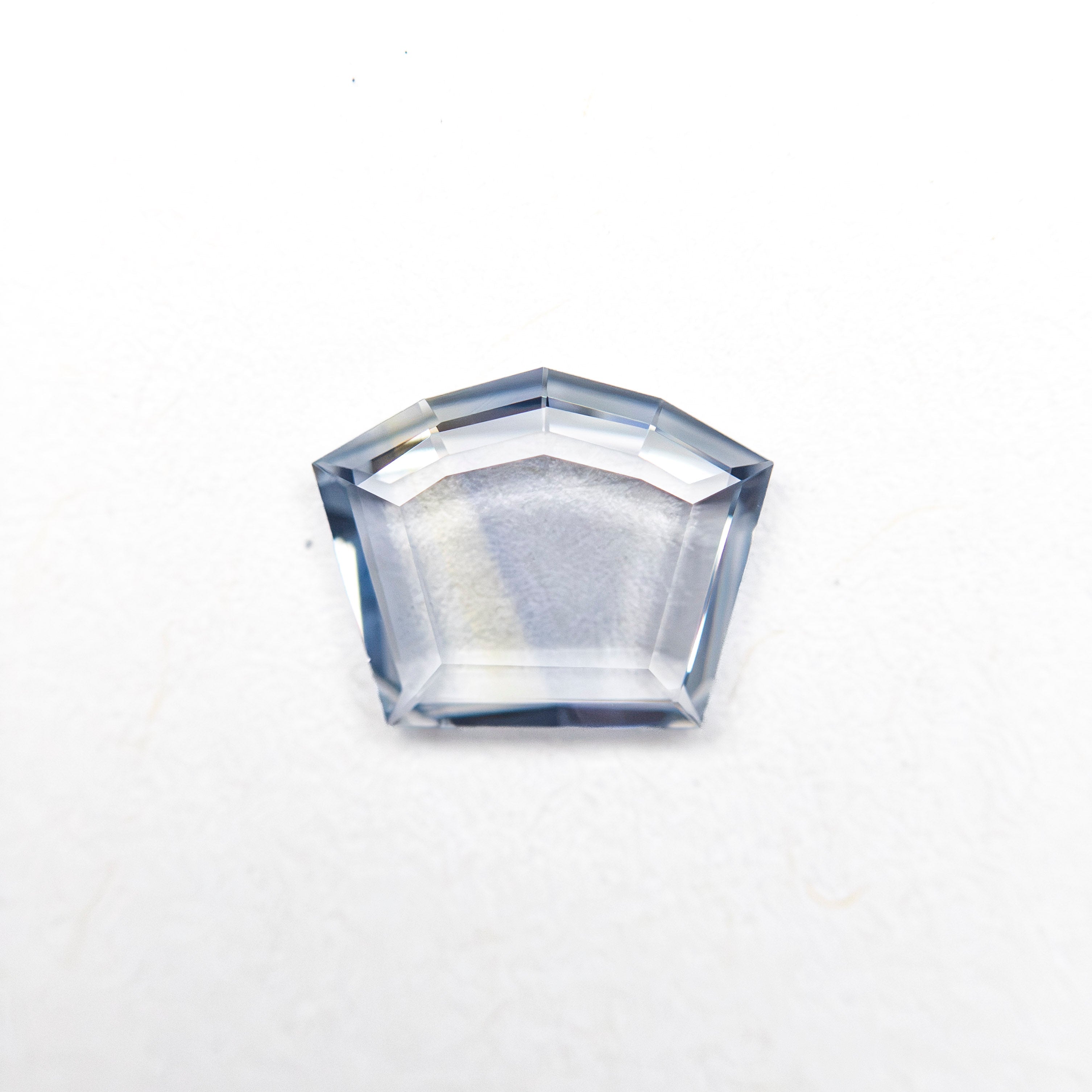 0.59ct 5.61x7.04x1.35mm Shield Portrait Cut Sapphire 27740-13 - Lelya - bespoke engagement and wedding rings made in Scotland, UK