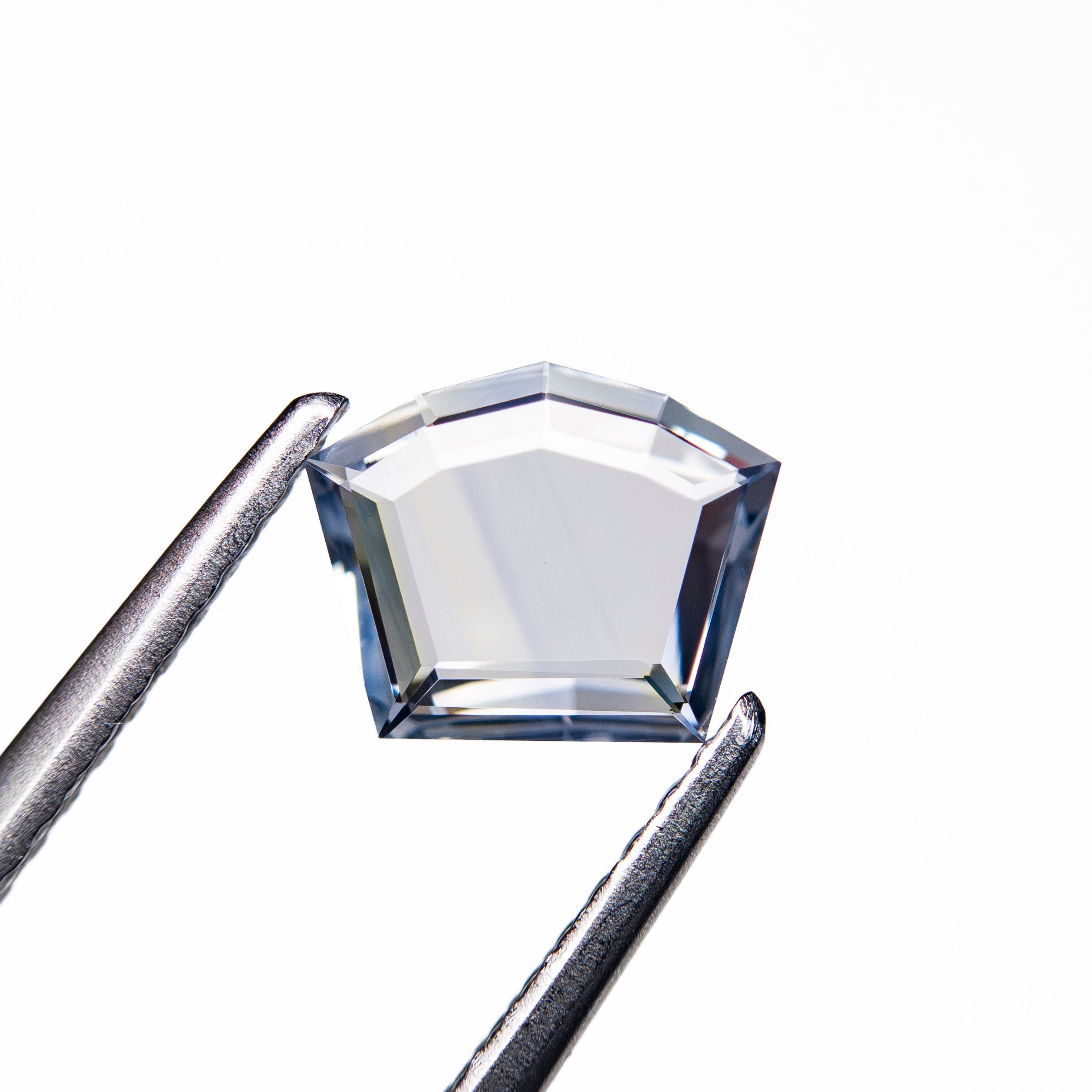 0.59ct 5.61x7.04x1.35mm Shield Portrait Cut Sapphire 27740-13 - Lelya - bespoke engagement and wedding rings made in Scotland, UK