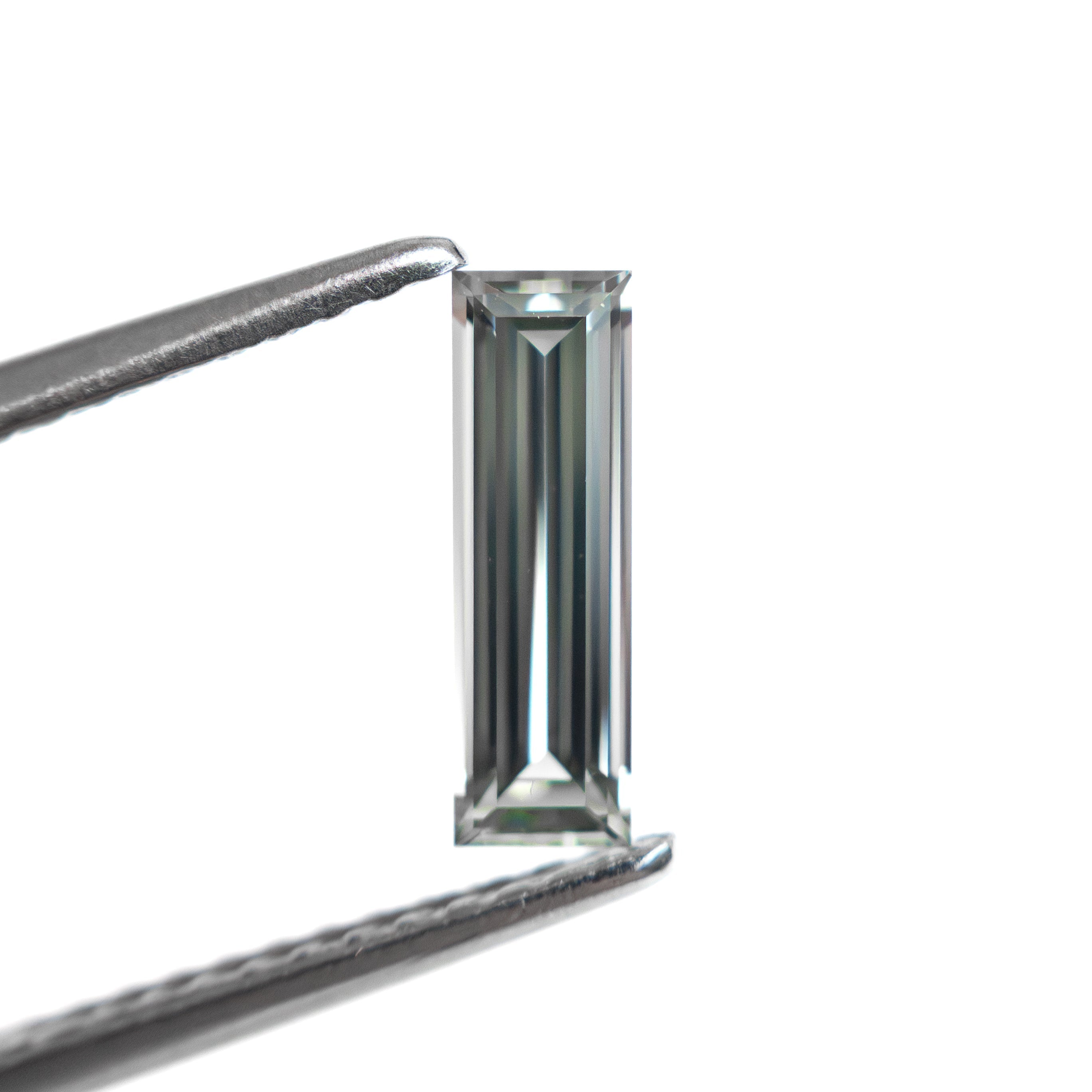0.59ct 9.05x2.80x2.00mm Baguette Step Cut Sapphire 27720 - 03 - Lelya - bespoke engagement and wedding rings made in Scotland, UK