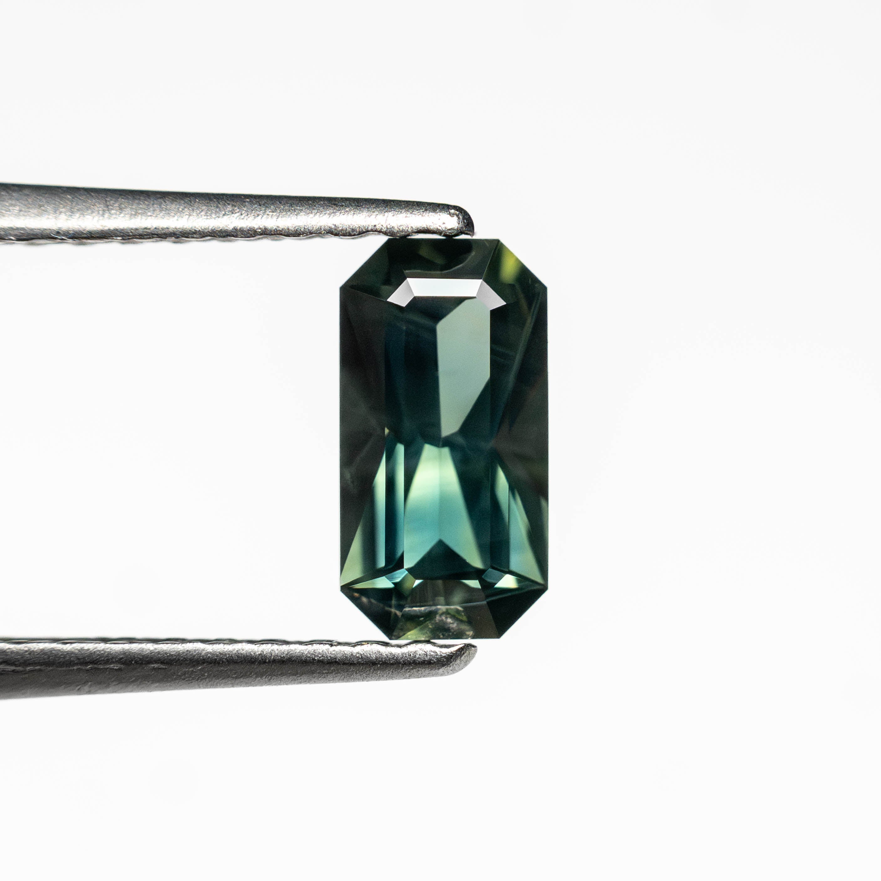 0.60ct 6.93x3.63x2.58mm Cut Corner Rectangle Step Cut Sapphire 27336 - 39 - Lelya - bespoke engagement and wedding rings made in Scotland, UK