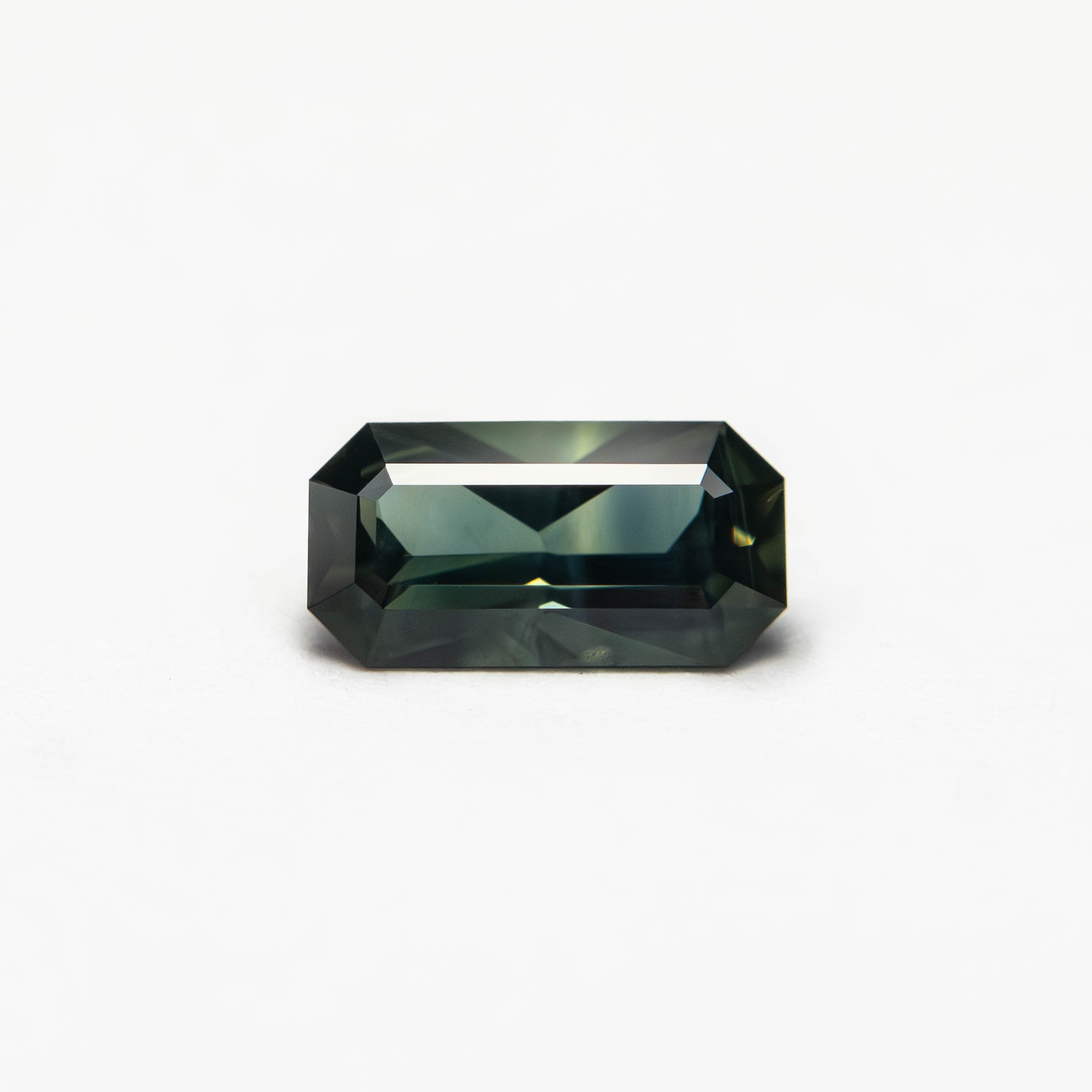 0.60ct 6.93x3.63x2.58mm Cut Corner Rectangle Step Cut Sapphire 27336 - 39 - Lelya - bespoke engagement and wedding rings made in Scotland, UK