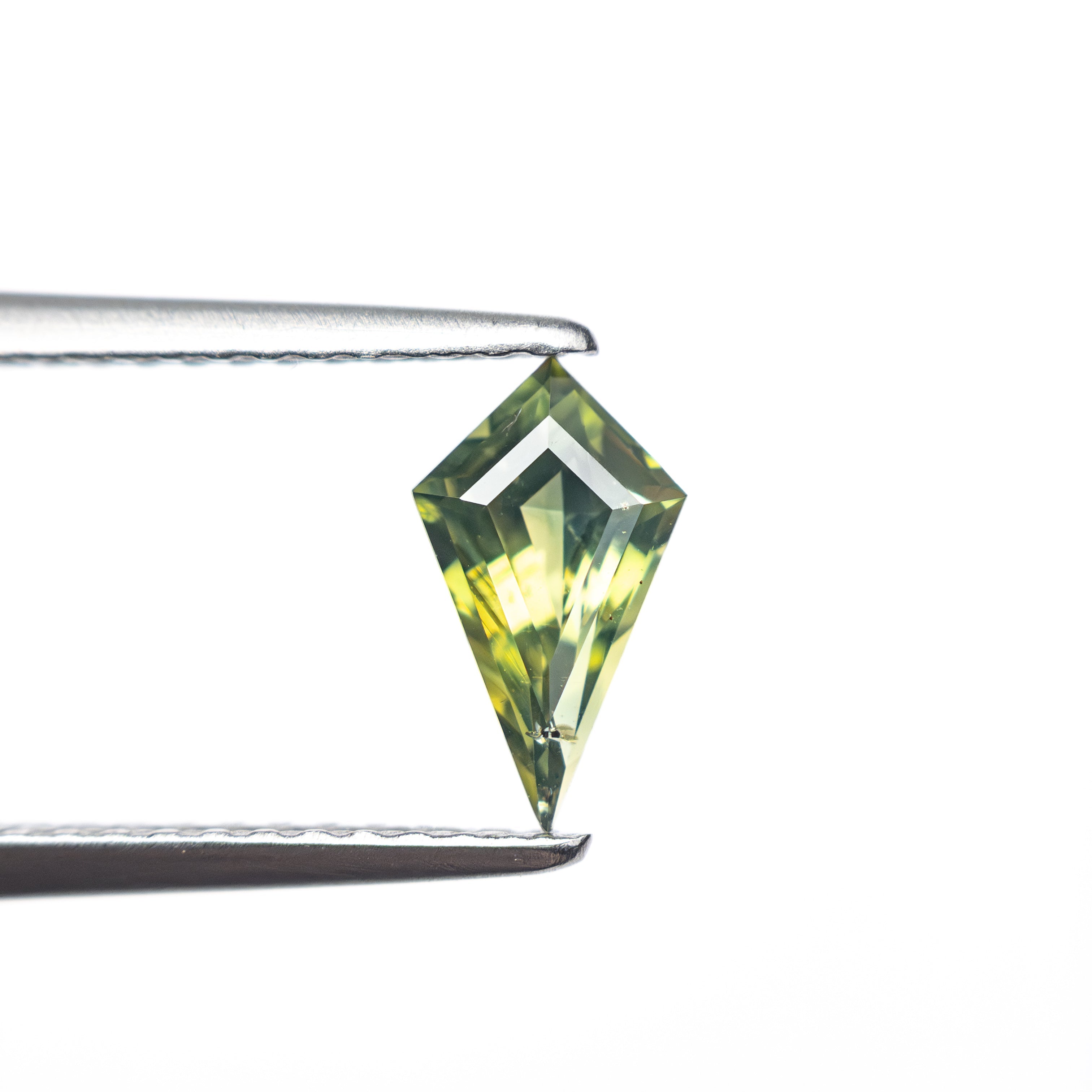 0.60ct 8.29x4.45x3.00mm Kite Step Cut Sapphire 27336 - 17 - Lelya - bespoke engagement and wedding rings made in Scotland, UK