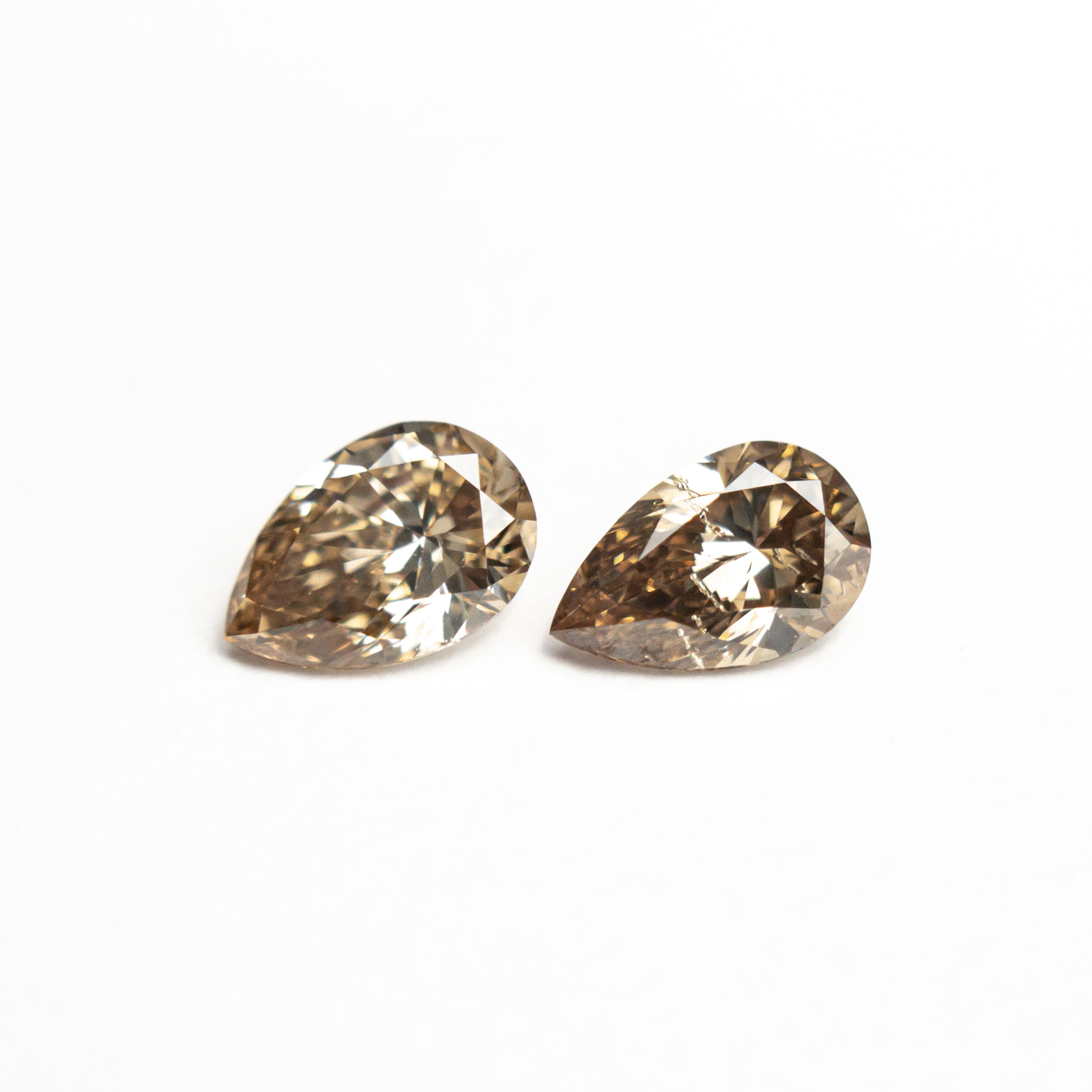 0.60cttw 2pc 5.54x3.75x2.26mm 5.56x3.52x2.34mm C5 - C6 SI2/I1 Pear Brilliant Matching Pair 22752 - 16 - Lelya - bespoke engagement and wedding rings made in Scotland, UK