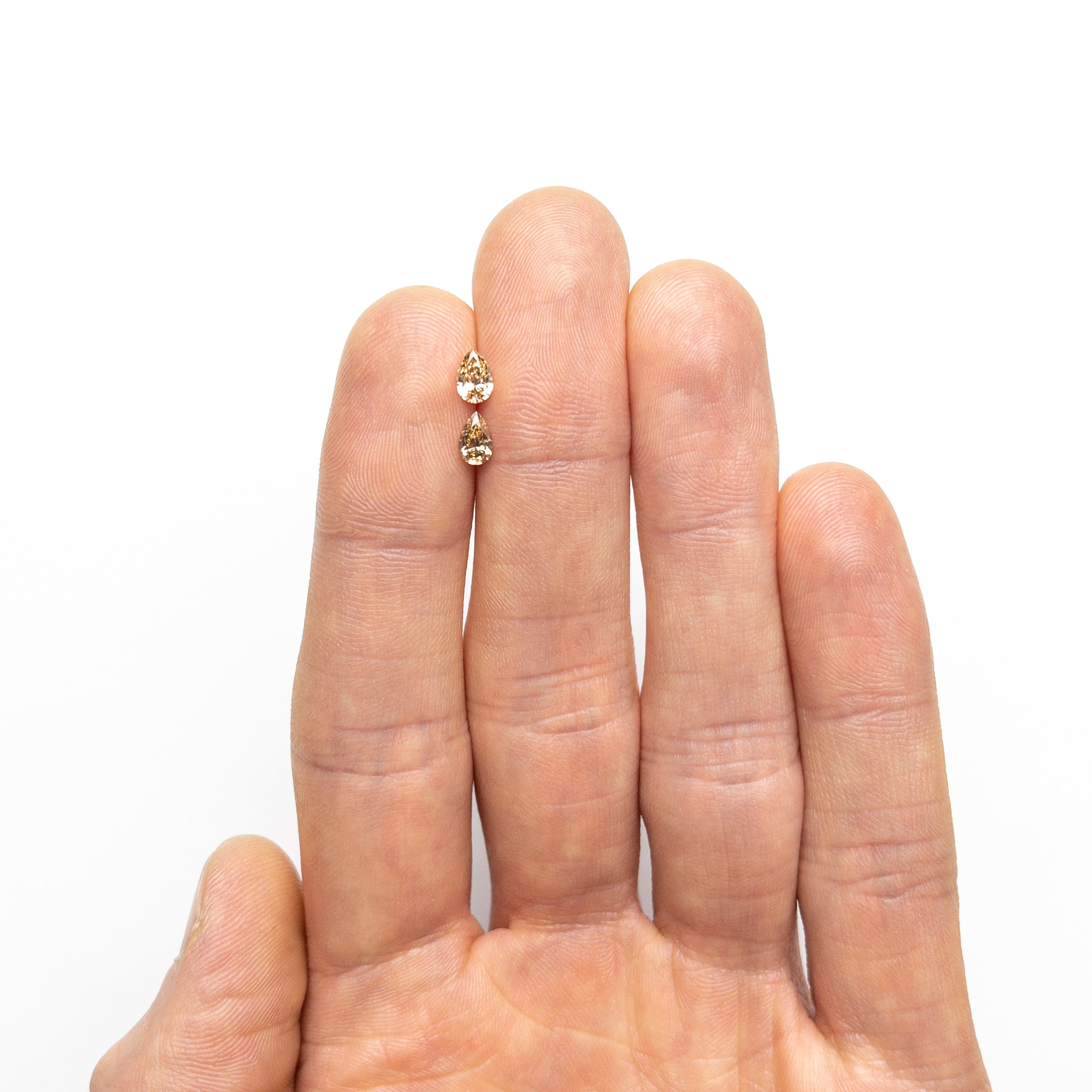 0.60cttw 2pc 5.54x3.75x2.26mm 5.56x3.52x2.34mm C5 - C6 SI2/I1 Pear Brilliant Matching Pair 22752 - 16 - Lelya - bespoke engagement and wedding rings made in Scotland, UK
