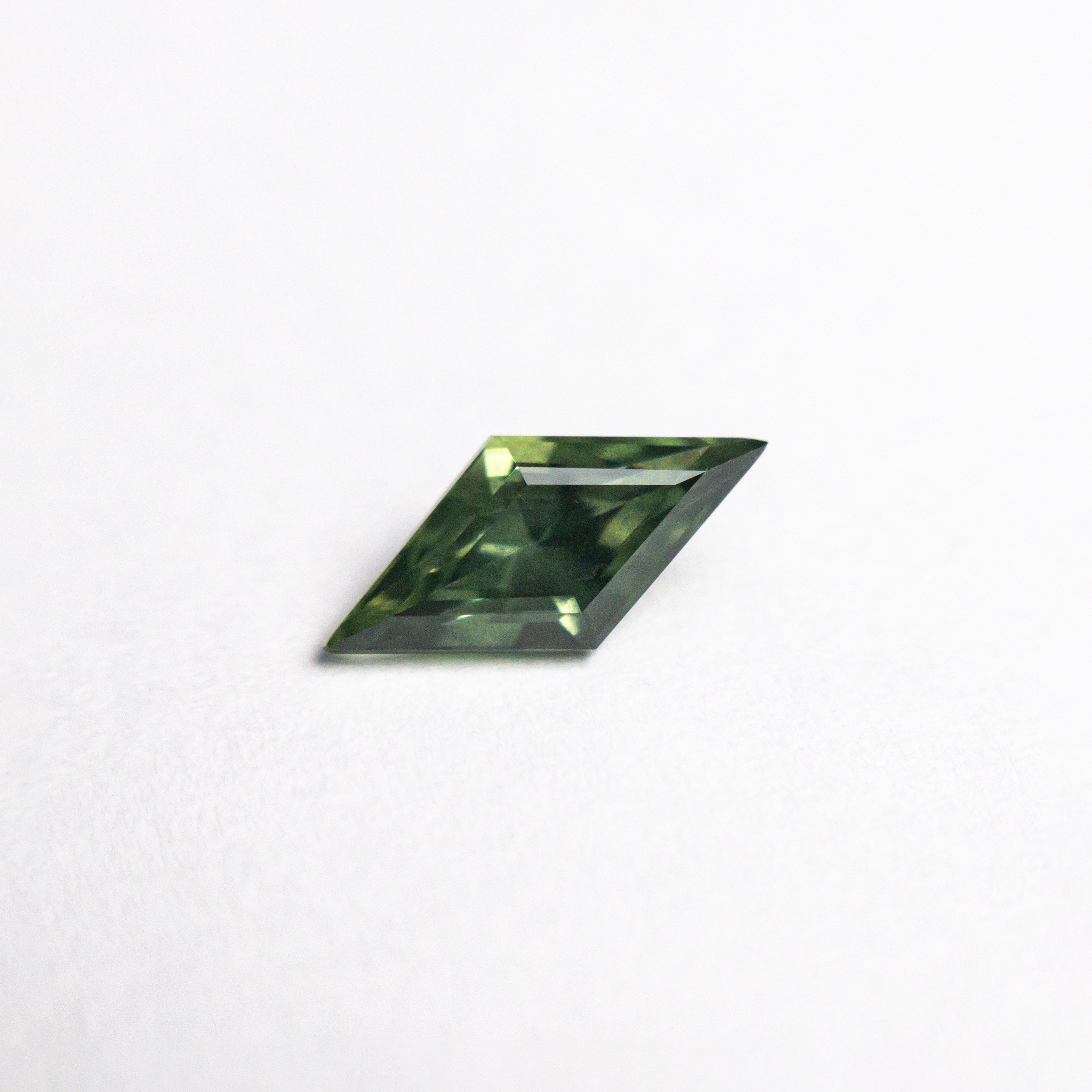 0.62ct 8.76x4.28x3.13mm Lozenge Step Cut Sapphire 25740 - 04 - Lelya - bespoke engagement and wedding rings made in Scotland, UK