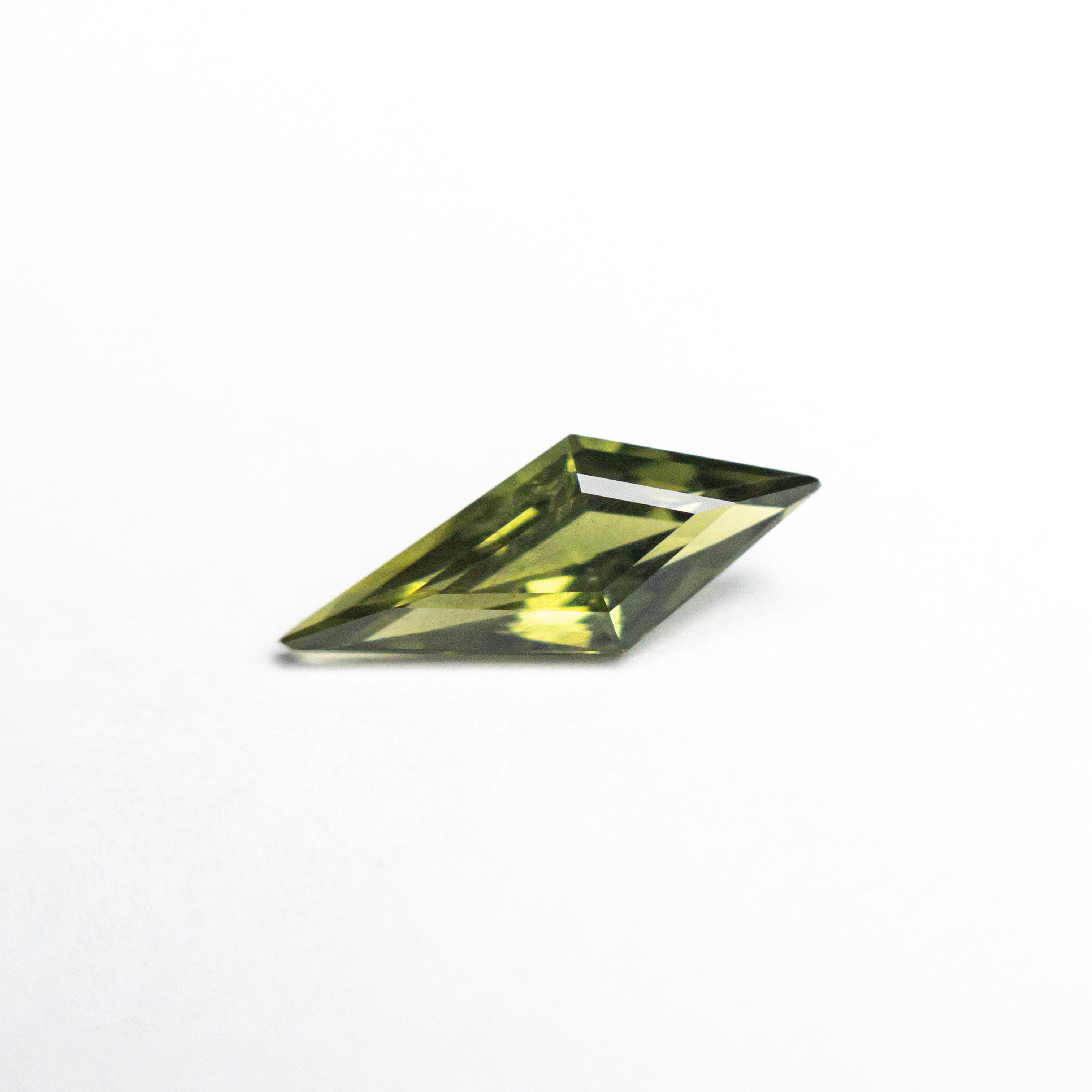0.63ct 10.05x4.07x2.72mm Kite Step Cut Sapphire 25740 - 10 - Lelya - bespoke engagement and wedding rings made in Scotland, UK