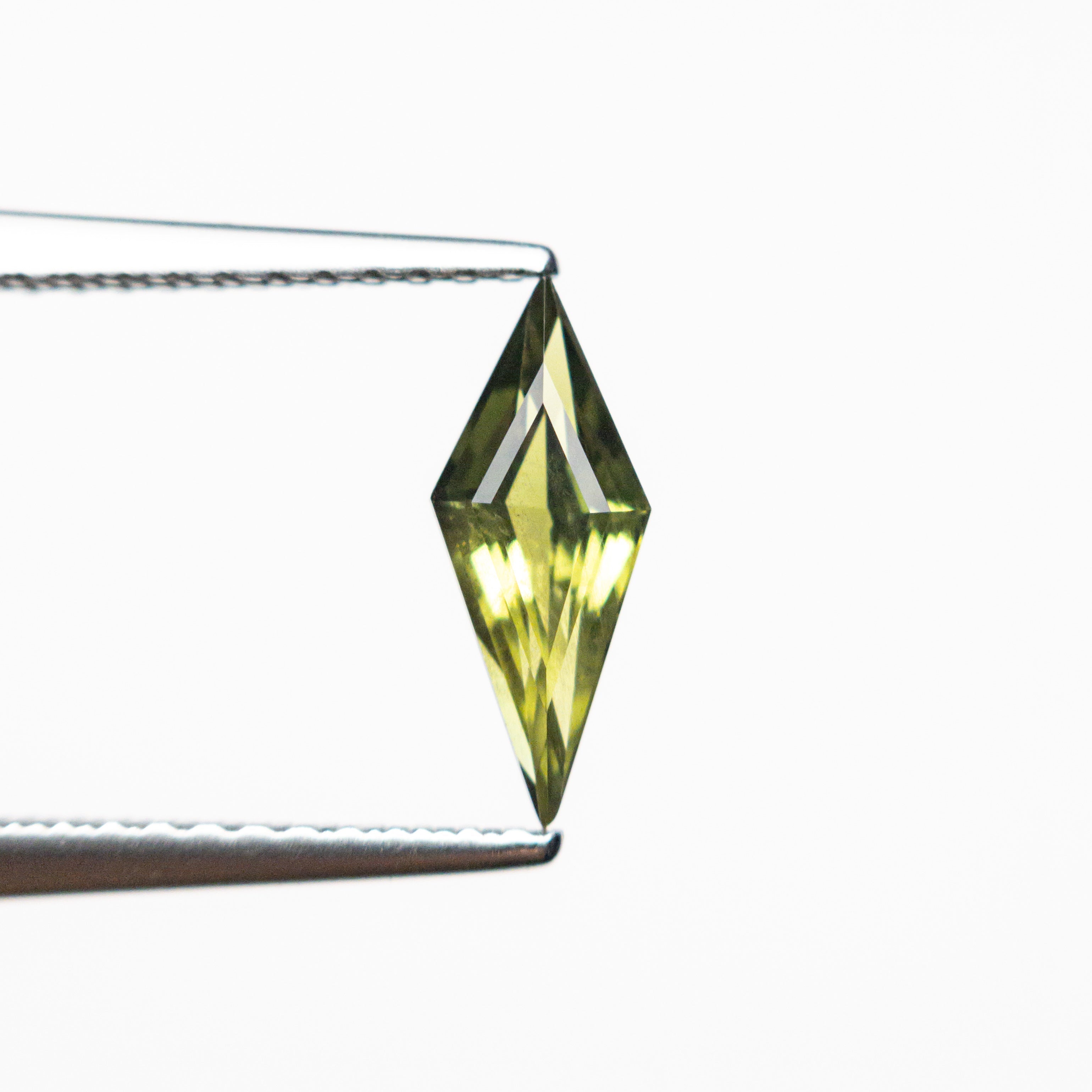0.63ct 10.05x4.07x2.72mm Kite Step Cut Sapphire 25740 - 10 - Lelya - bespoke engagement and wedding rings made in Scotland, UK