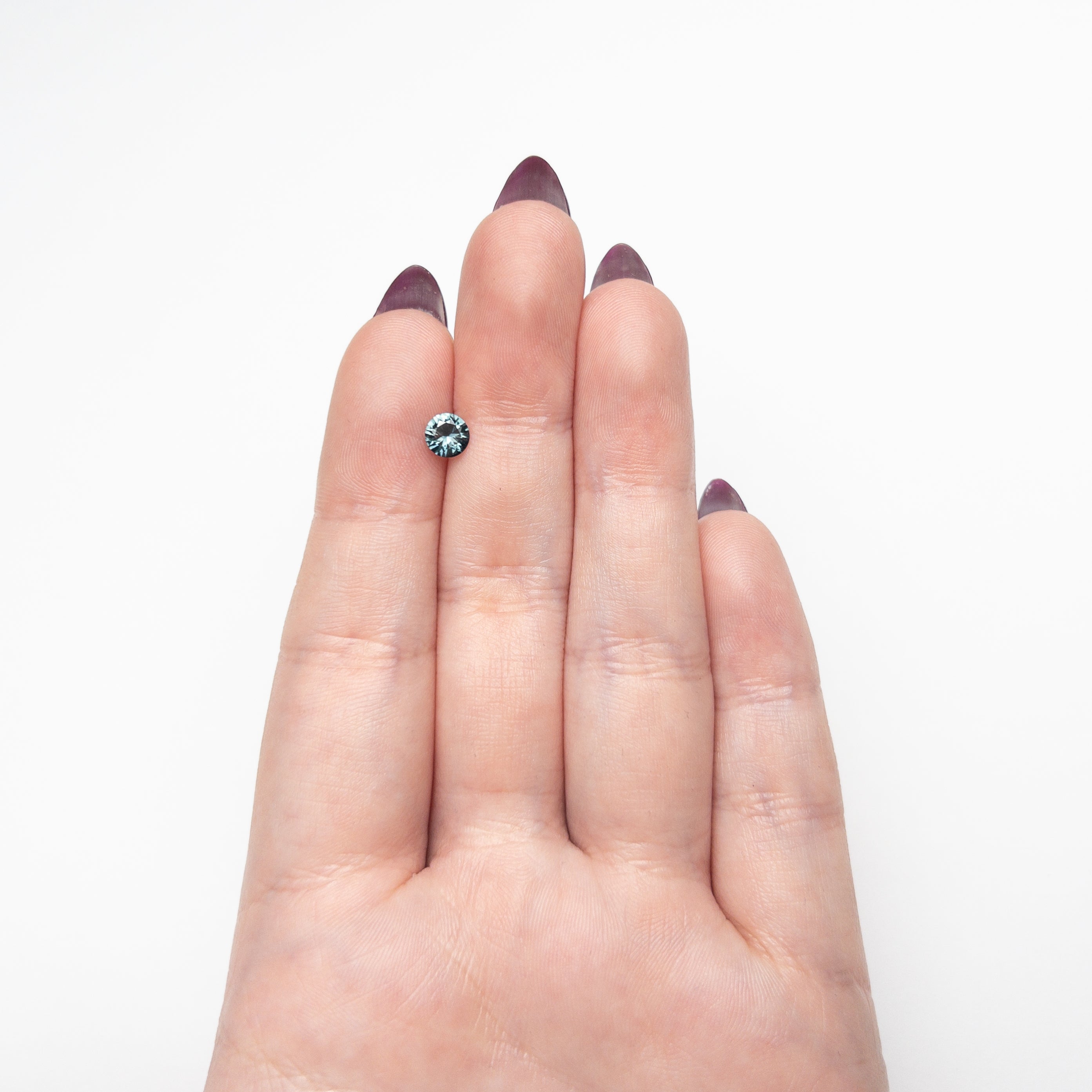 0.63ct 5.5.28x5.27x3.12mm Round Brilliant Sapphire 26526-10 - Lelya - bespoke engagement and wedding rings made in Scotland, UK