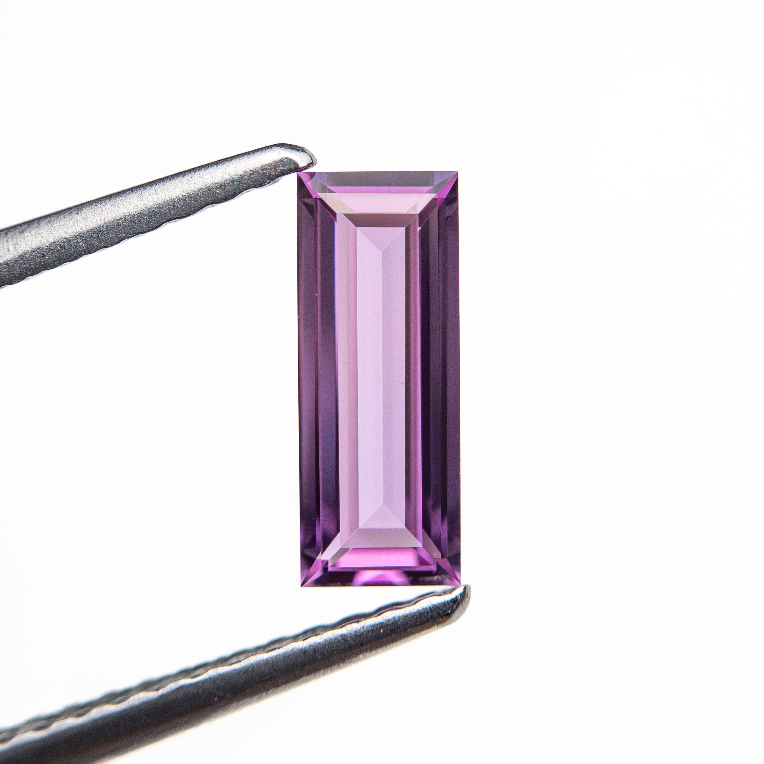 0.65ct 8.81x3.41x1.88mm Baguette Step Cut Sapphire 27721 - 07 - Lelya - bespoke engagement and wedding rings made in Scotland, UK
