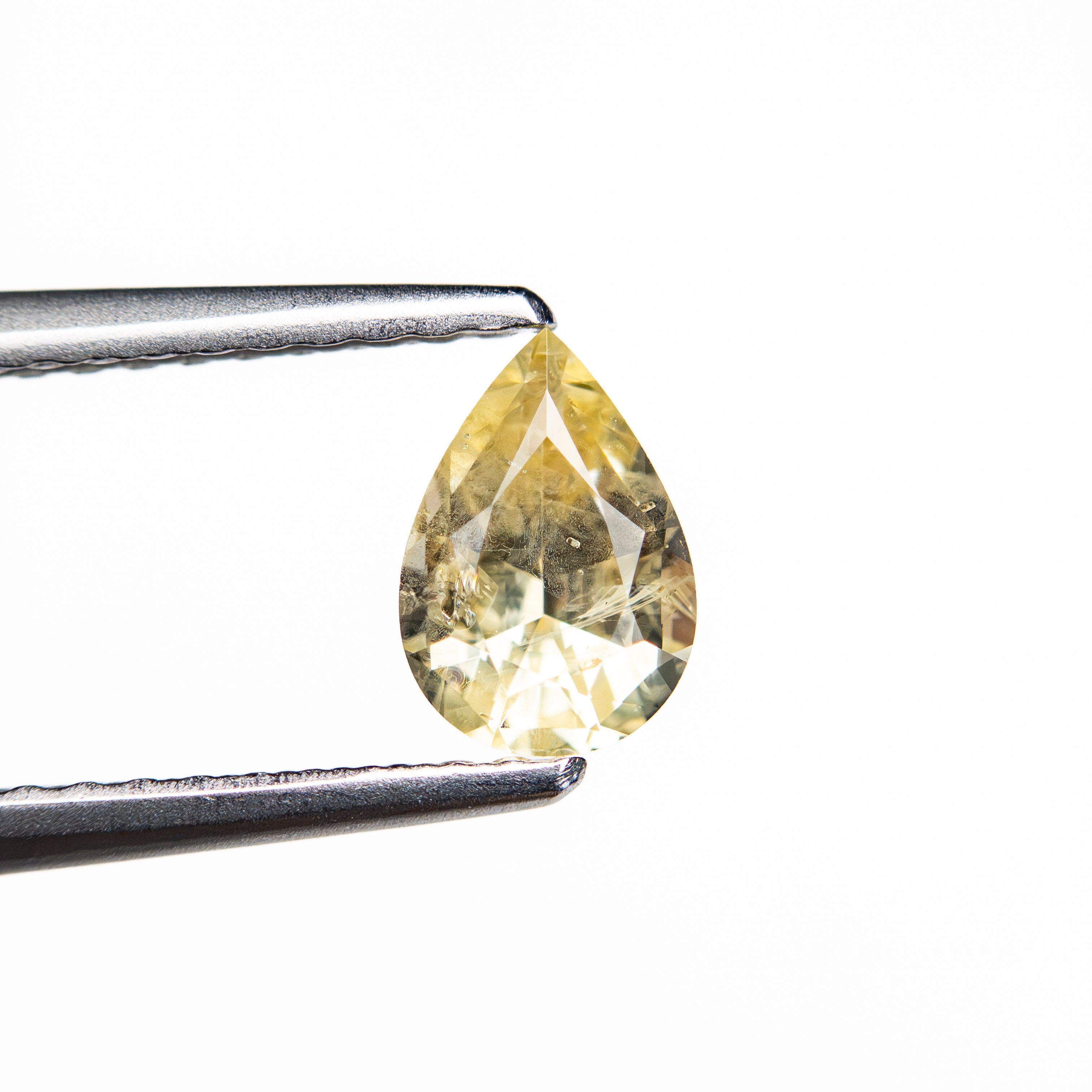 0.66ct 6.52x4.53x3.17mm Pear Brilliant Sapphire 26145-01 - Lelya - bespoke engagement and wedding rings made in Scotland, UK
