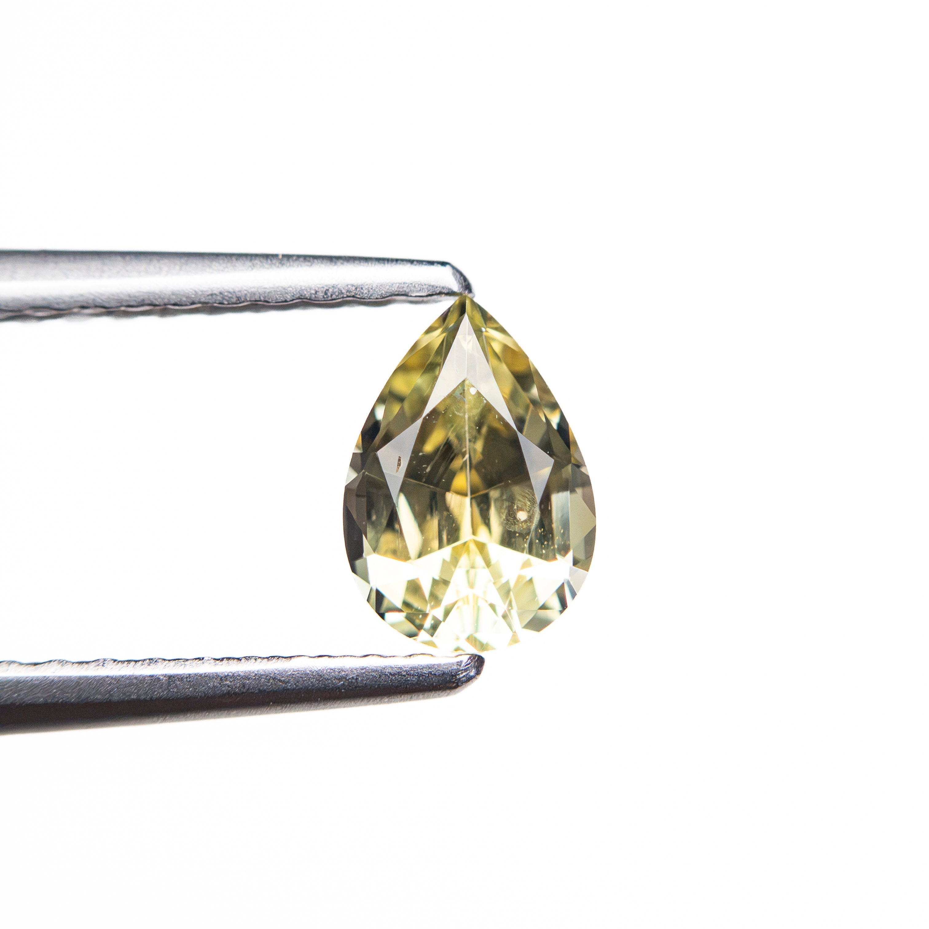 0.67ct 6.41x4.51x3.15mm Pear Brilliant Sapphire 26145-02 - Lelya - bespoke engagement and wedding rings made in Scotland, UK