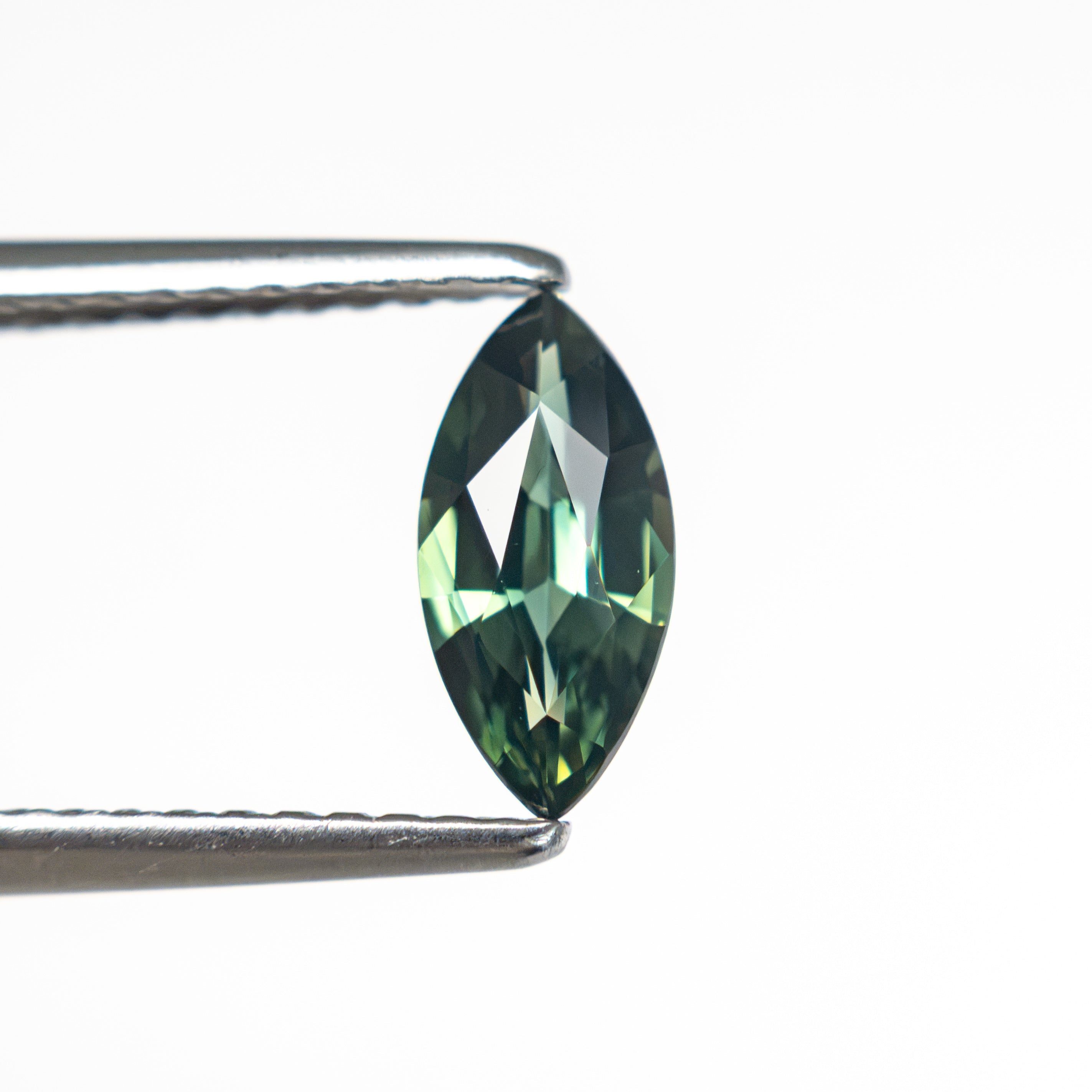 0.67ct 8.62x4.04x2.57mm Marquise Brilliant Sapphire 27340-03 - Lelya - bespoke engagement and wedding rings made in Scotland, UK