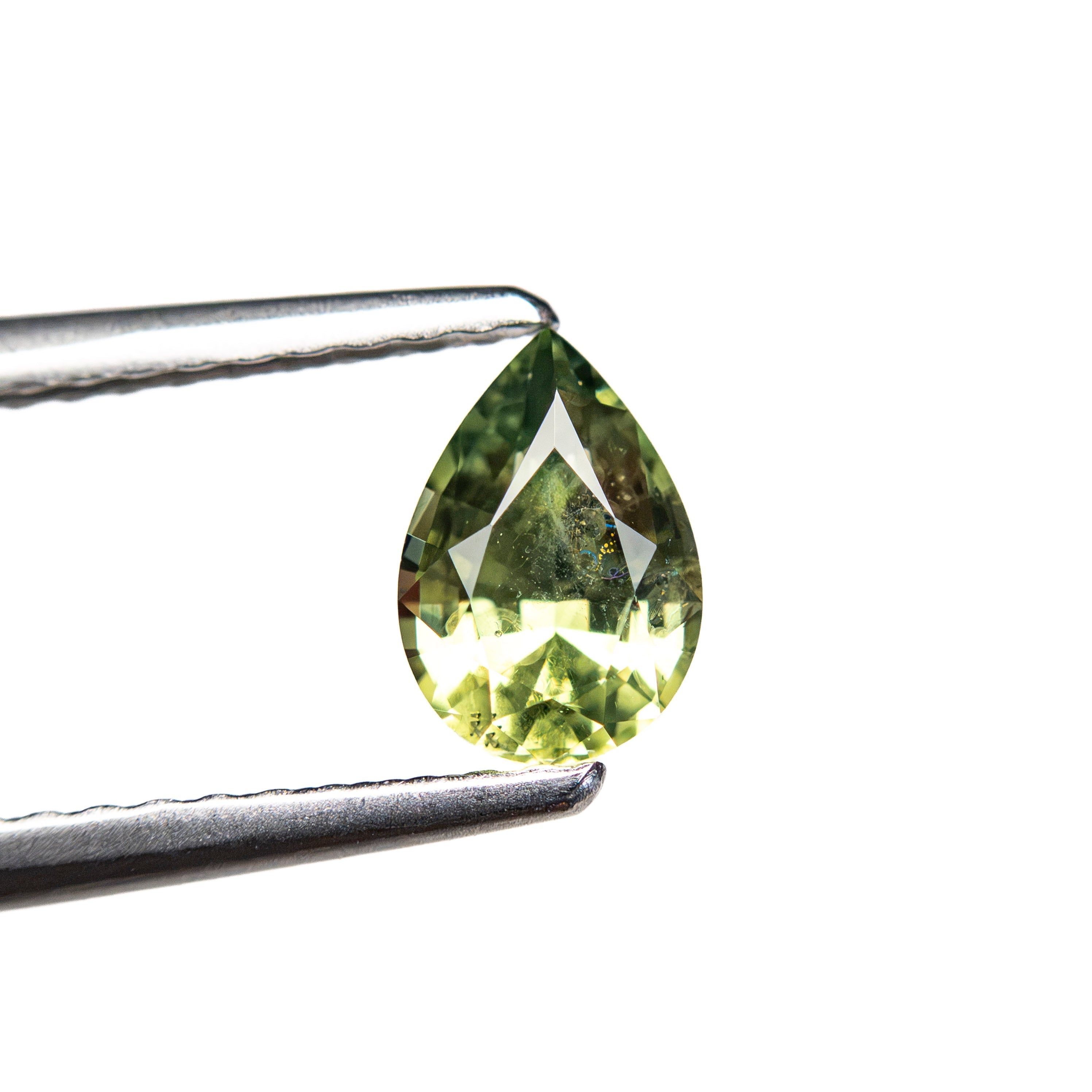 0.69ct 6.51x4.48x3.17mm Pear Brilliant Sapphire 26145-03 - Lelya - bespoke engagement and wedding rings made in Scotland, UK