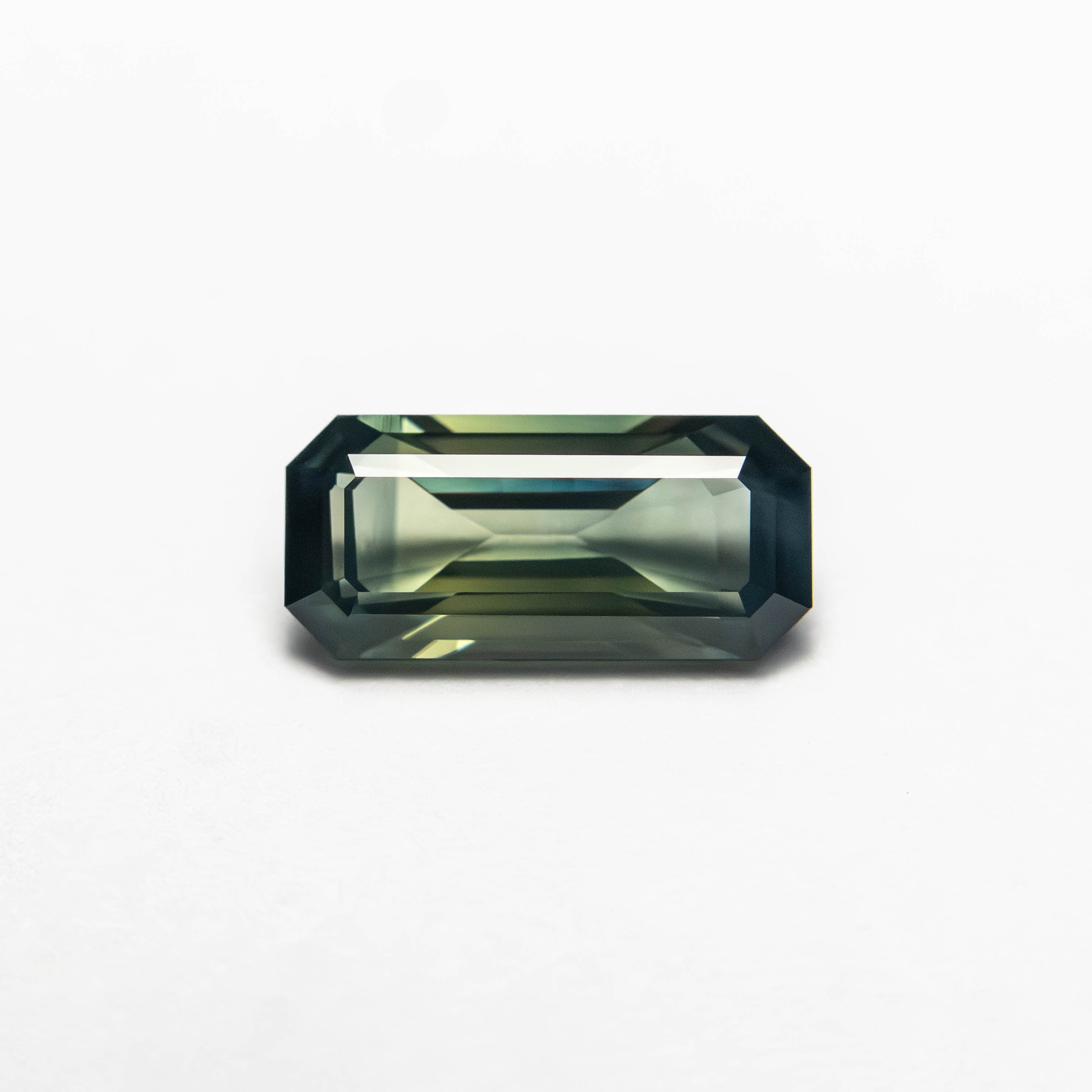 0.71ct 7.78x3.64x2.46mm Cut Corner Rectangle Step Cut Sapphire 27336 - 53 - Lelya - bespoke engagement and wedding rings made in Scotland, UK