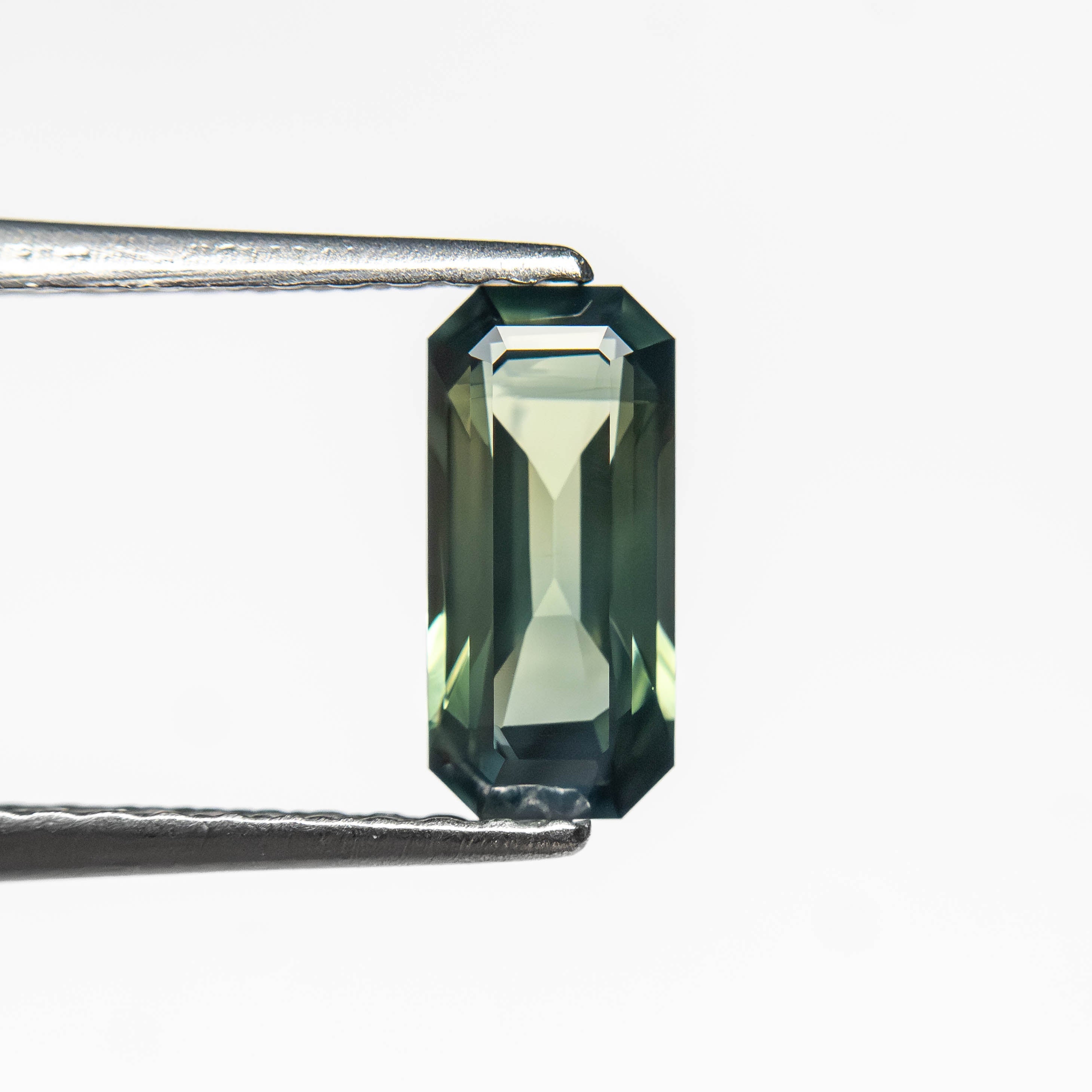 0.71ct 7.78x3.64x2.46mm Cut Corner Rectangle Step Cut Sapphire 27336 - 53 - Lelya - bespoke engagement and wedding rings made in Scotland, UK