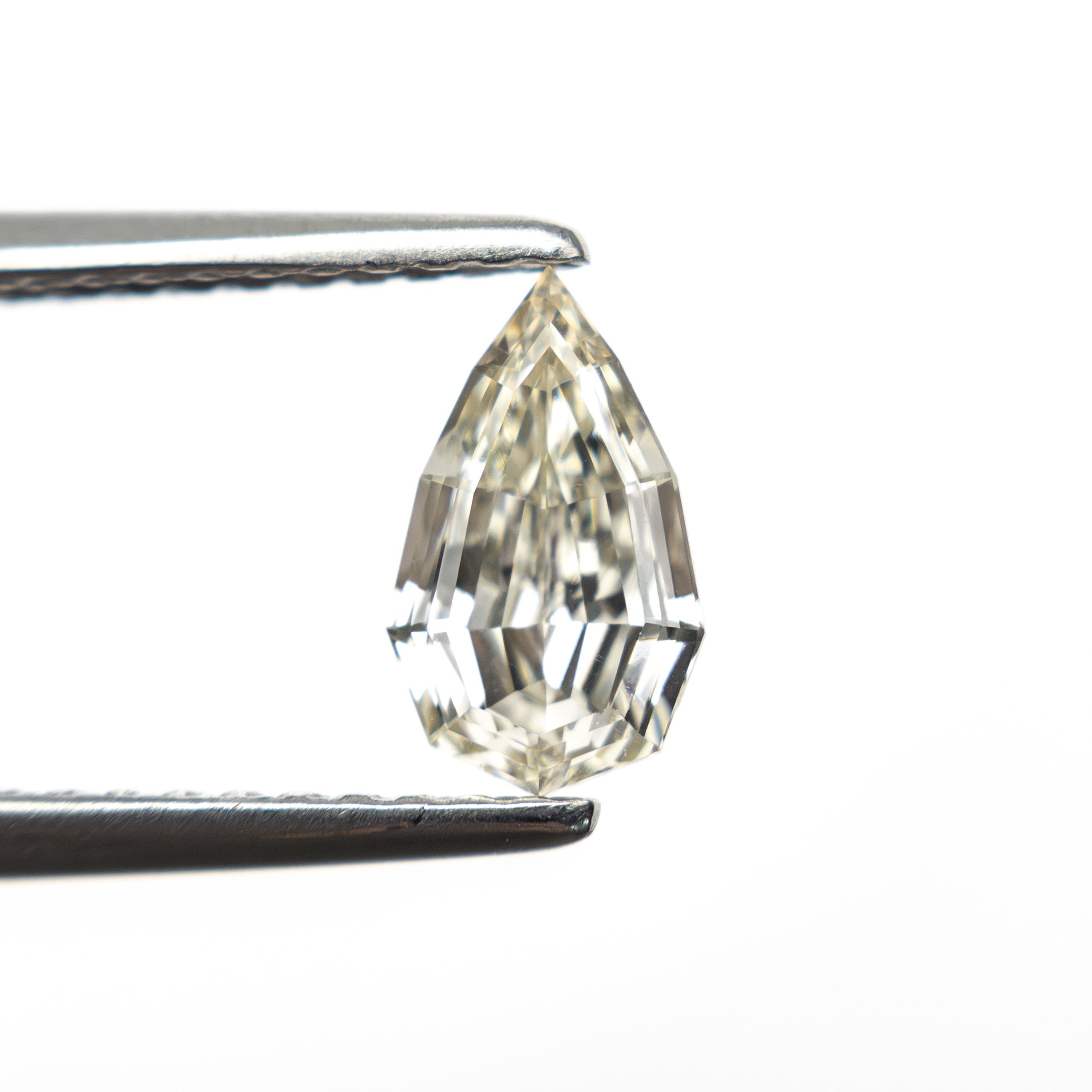 0.71ct 7.85x4.68x2.90mm VVS2 Q - R Geo Pear Step Cut 🇿🇦 27364 - 15 - Lelya - bespoke engagement and wedding rings made in Scotland, UK