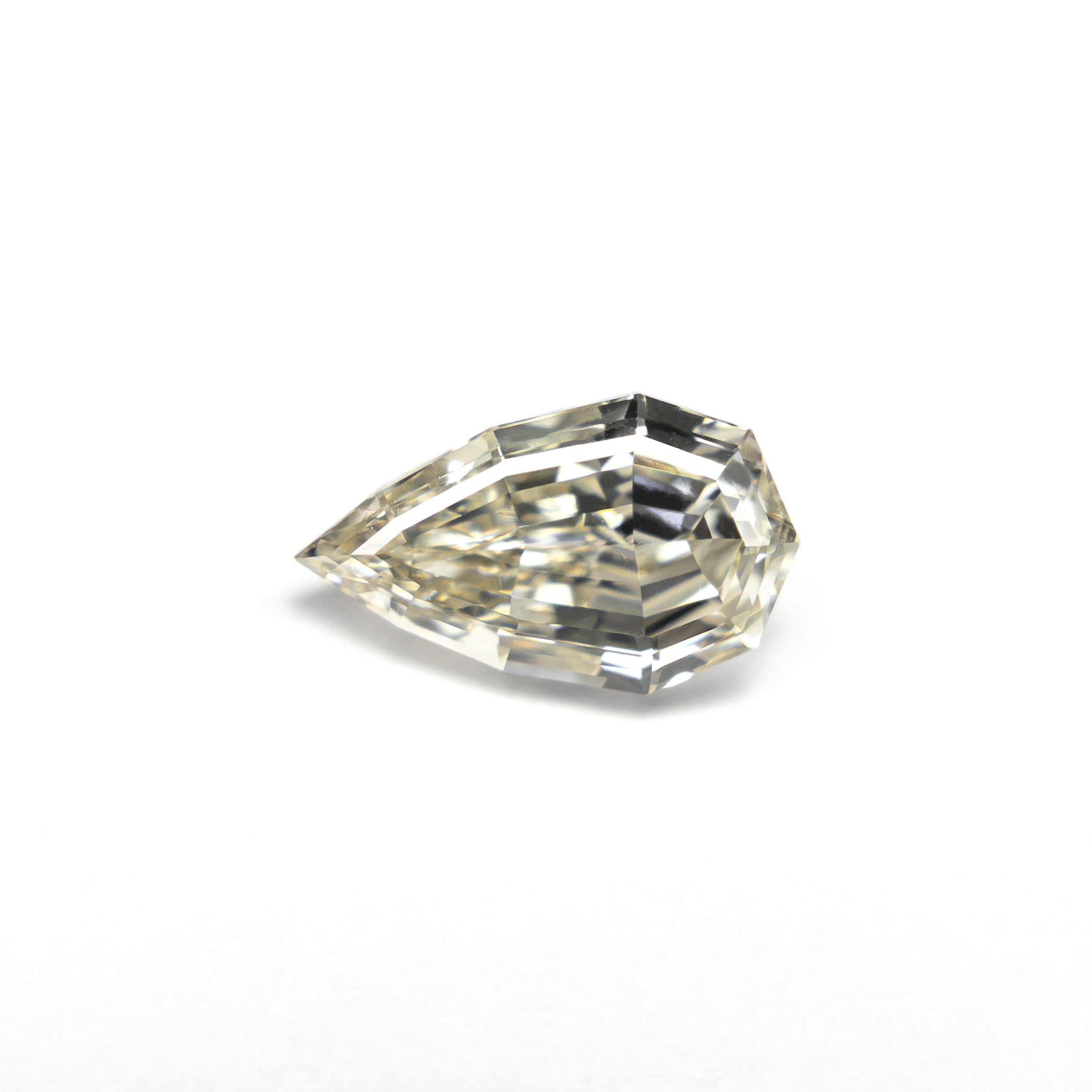 0.71ct 7.85x4.68x2.90mm VVS2 Q - R Geo Pear Step Cut 🇿🇦 27364 - 15 - Lelya - bespoke engagement and wedding rings made in Scotland, UK