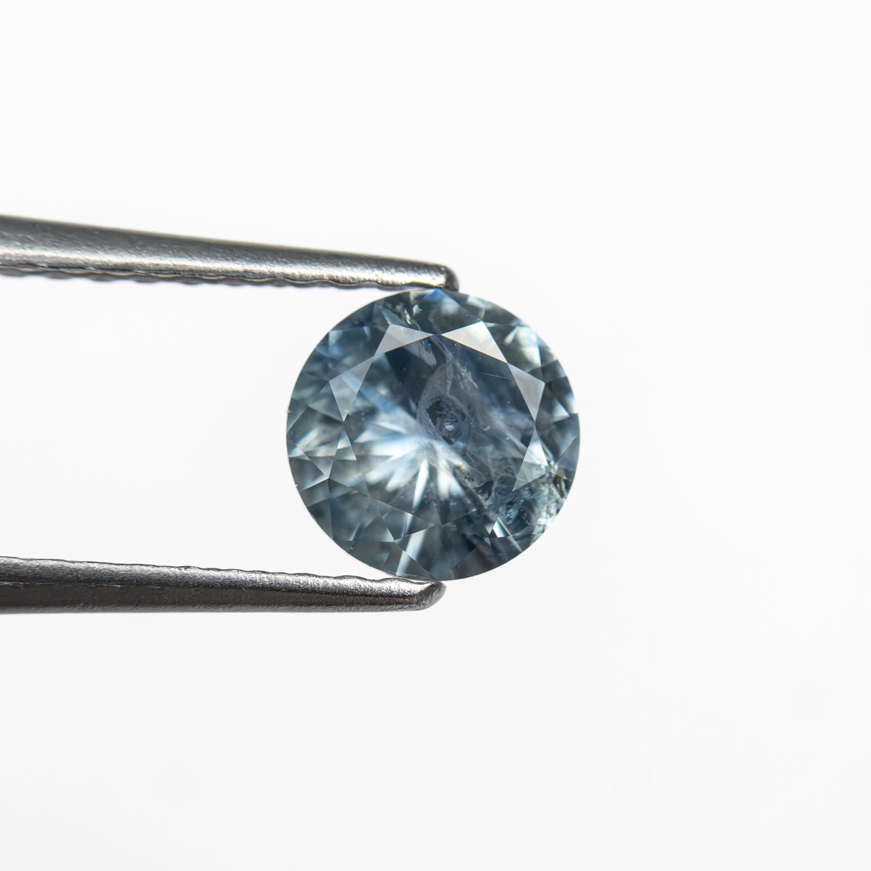 0.73ct 5.57x5.53x3.29mm Round Brilliant Sapphire 26134-27 - Lelya - bespoke engagement and wedding rings made in Scotland, UK