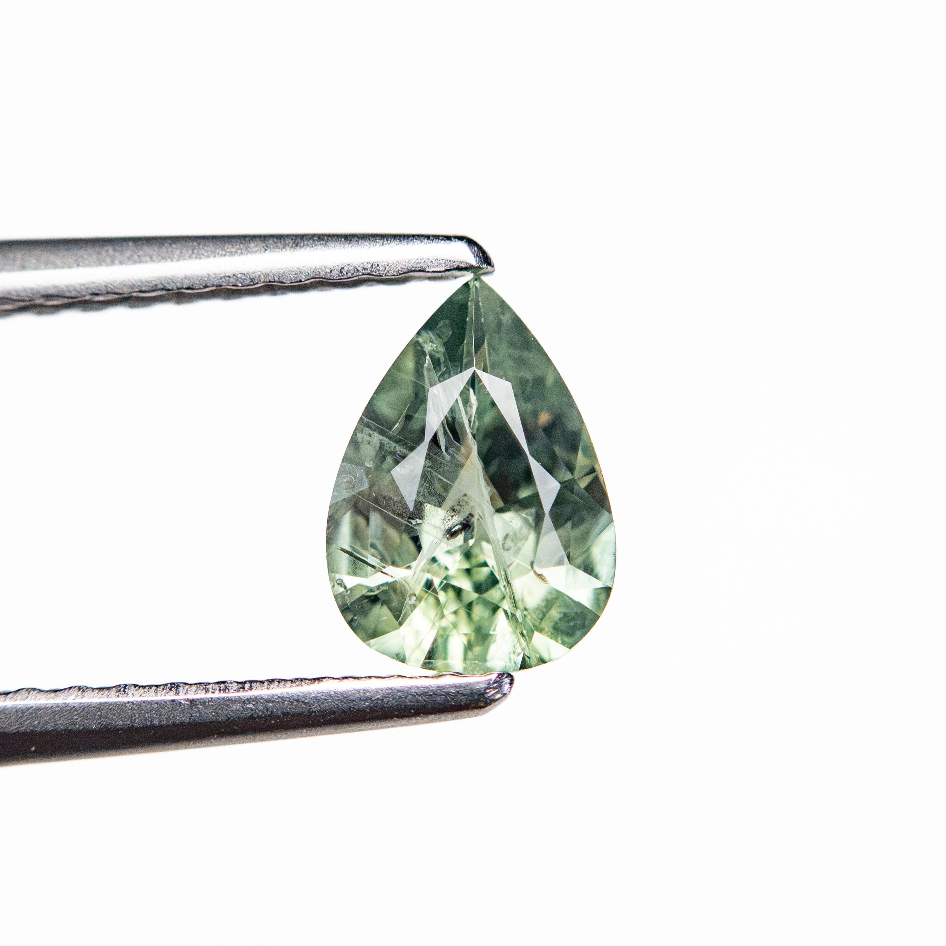 0.74ct 7.05x5.07x3.05mm Pear Brilliant Sapphire 26150-12 - Lelya - bespoke engagement and wedding rings made in Scotland, UK