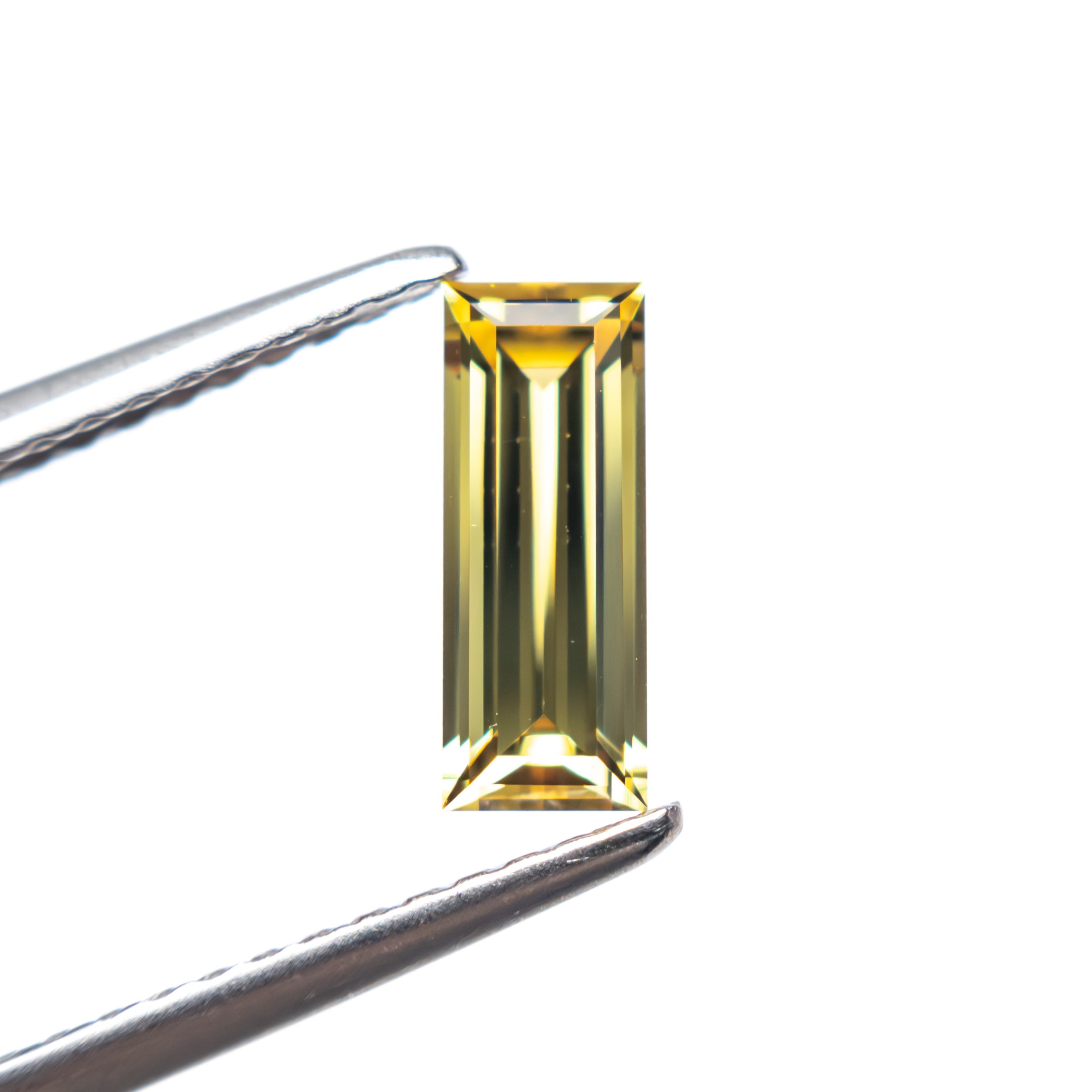 0.75ct 8.56x3.27x2.36mm Baguette Step Cut Sapphire 27719 - 03 - Lelya - bespoke engagement and wedding rings made in Scotland, UK
