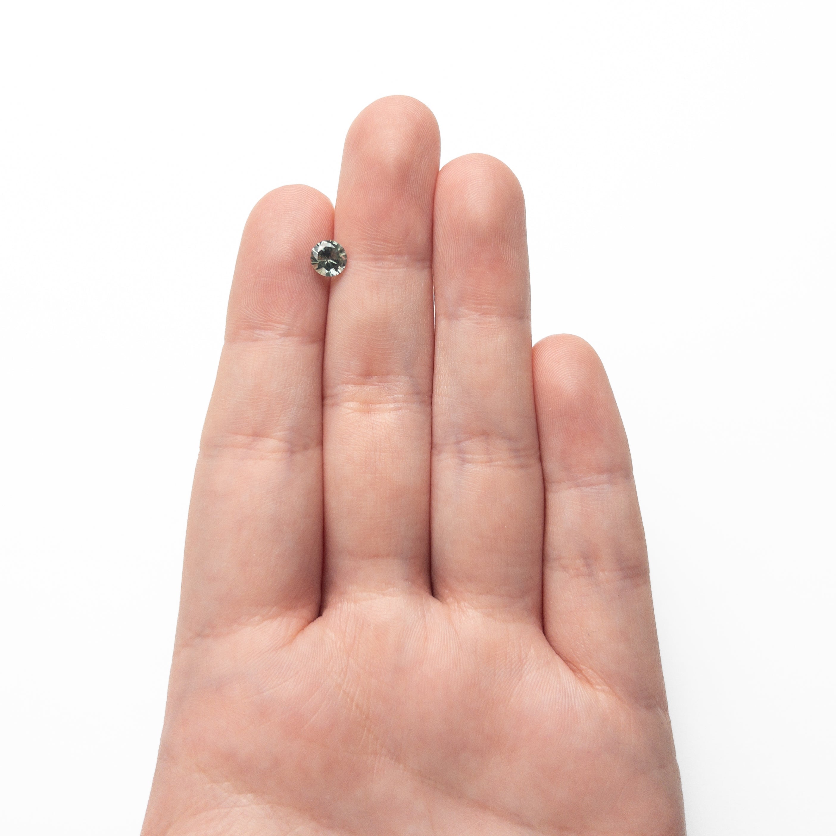 0.76ct 5.55x5.22x3.43mm Round Brilliant Sapphire 26134-03 - Lelya - bespoke engagement and wedding rings made in Scotland, UK