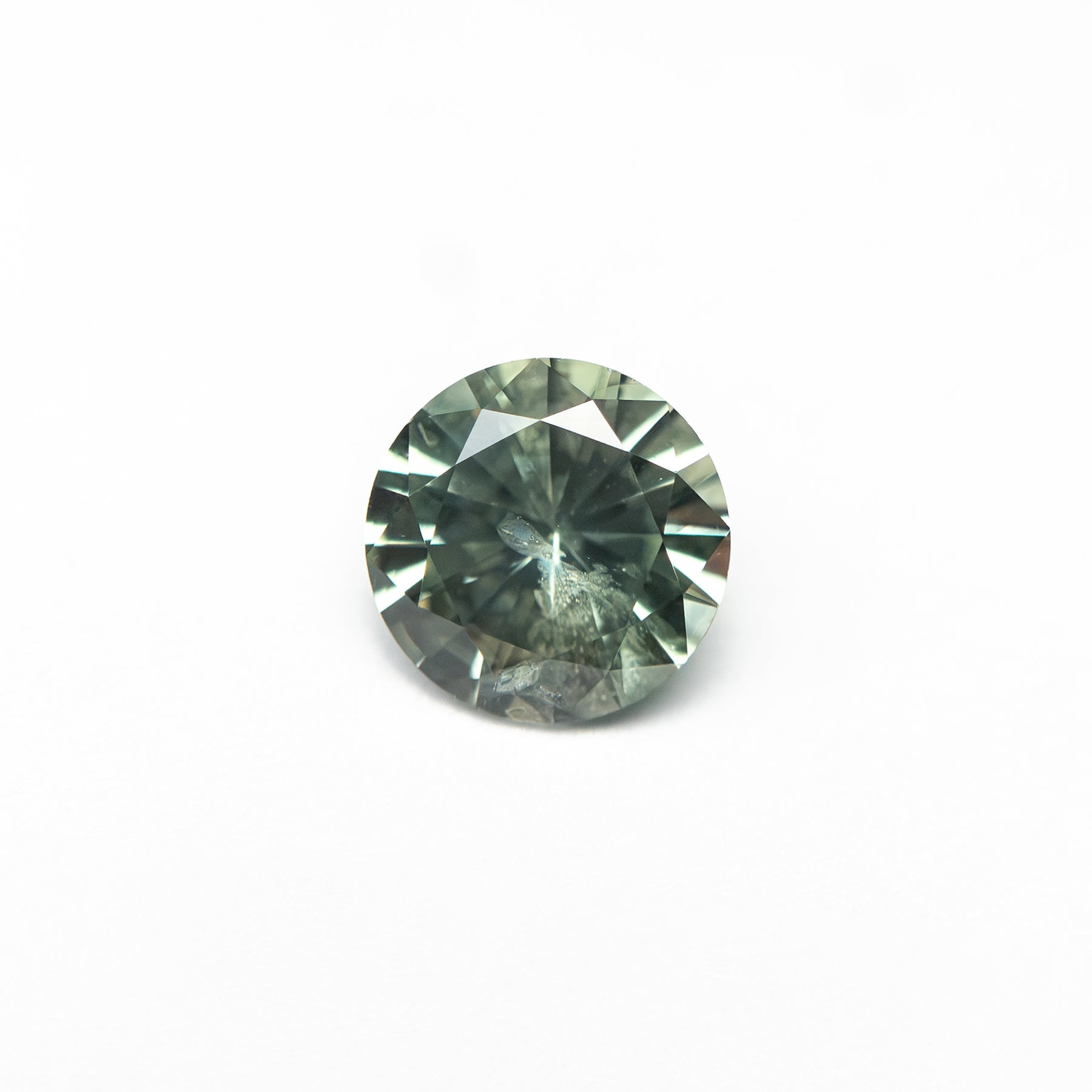 0.76ct 5.55x5.22x3.43mm Round Brilliant Sapphire 26134-03 - Lelya - bespoke engagement and wedding rings made in Scotland, UK