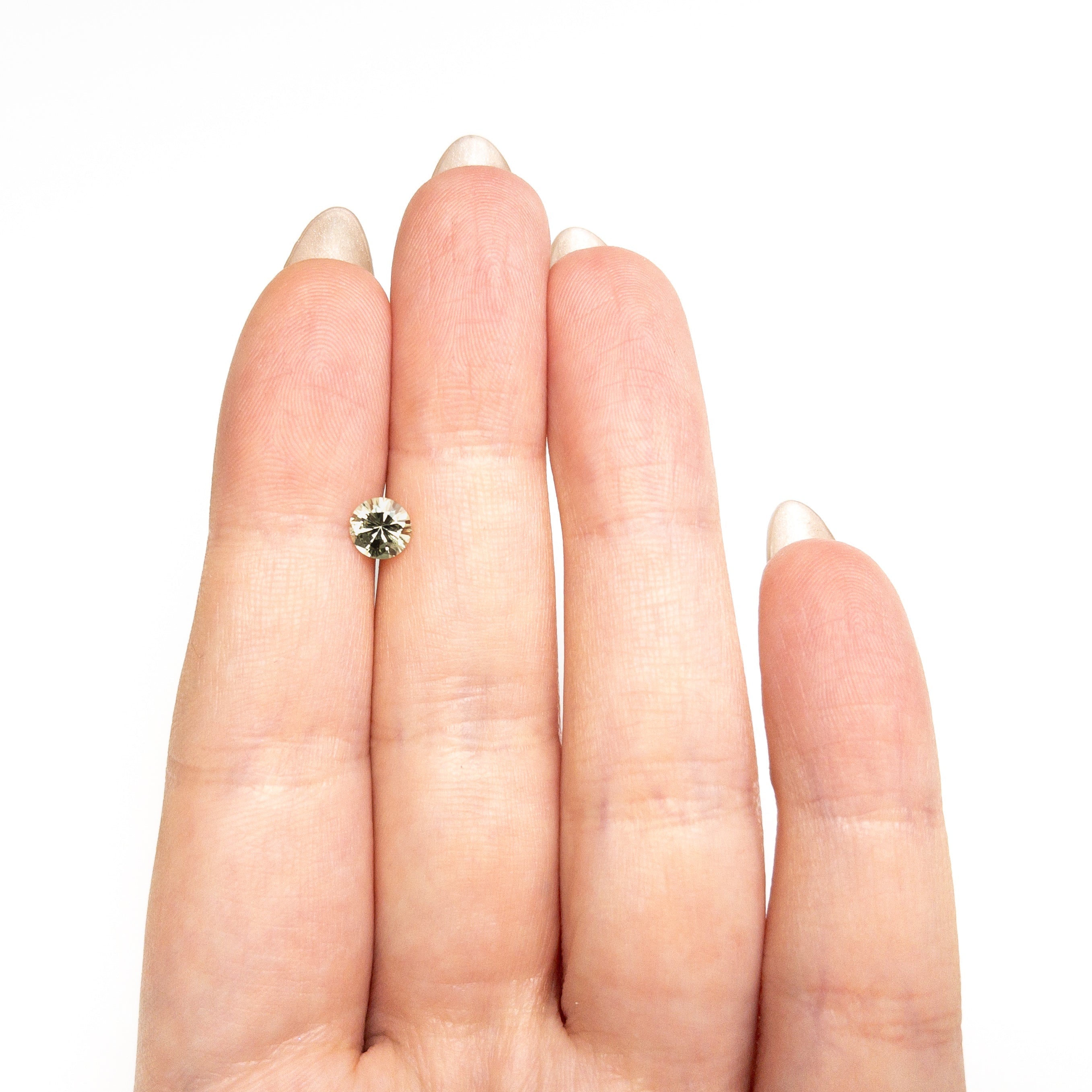 0.76ct 5.56x5.52x3.52mm Round Brilliant Sapphire 26134-16 - Lelya - bespoke engagement and wedding rings made in Scotland, UK