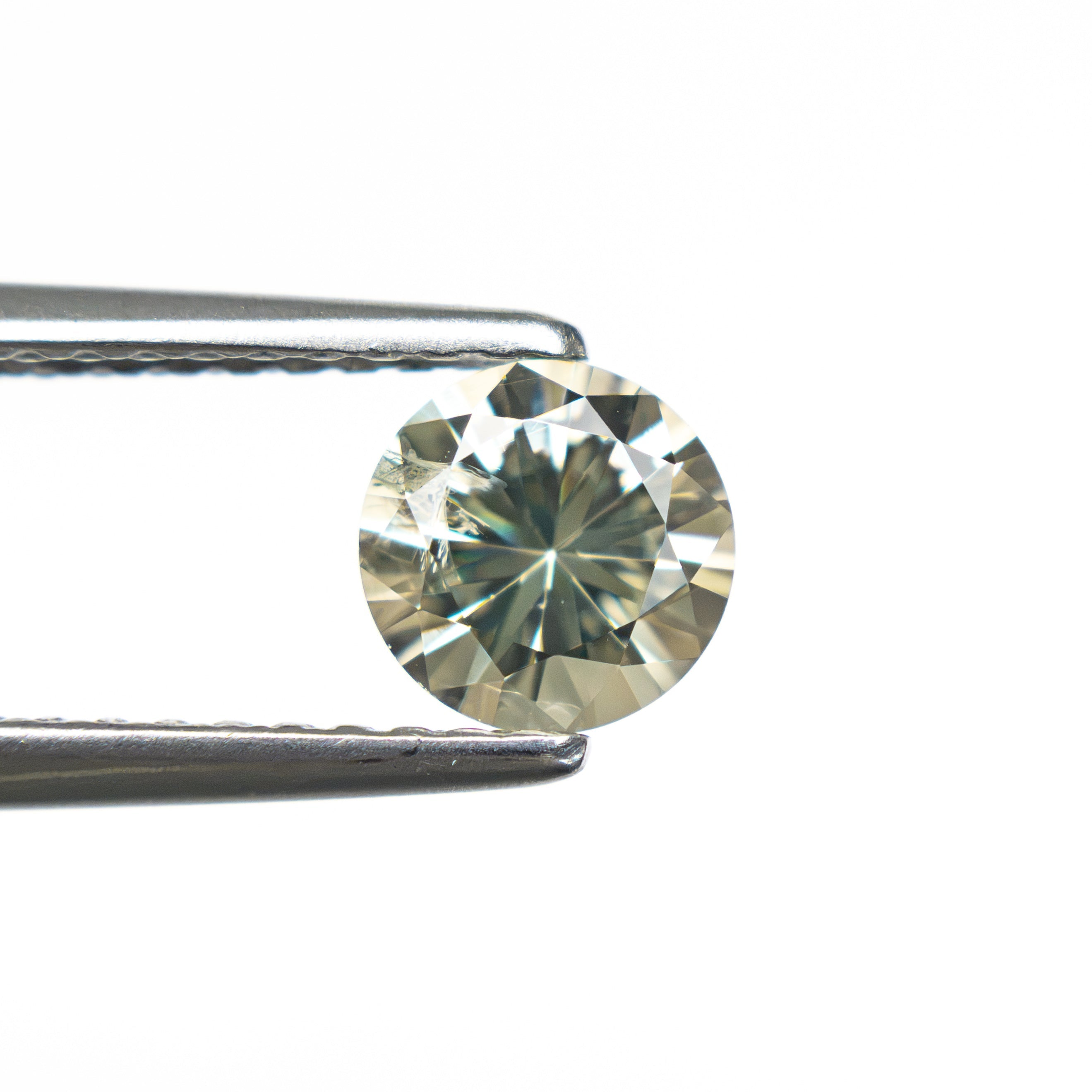 0.76ct 5.56x5.52x3.52mm Round Brilliant Sapphire 26134-16 - Lelya - bespoke engagement and wedding rings made in Scotland, UK