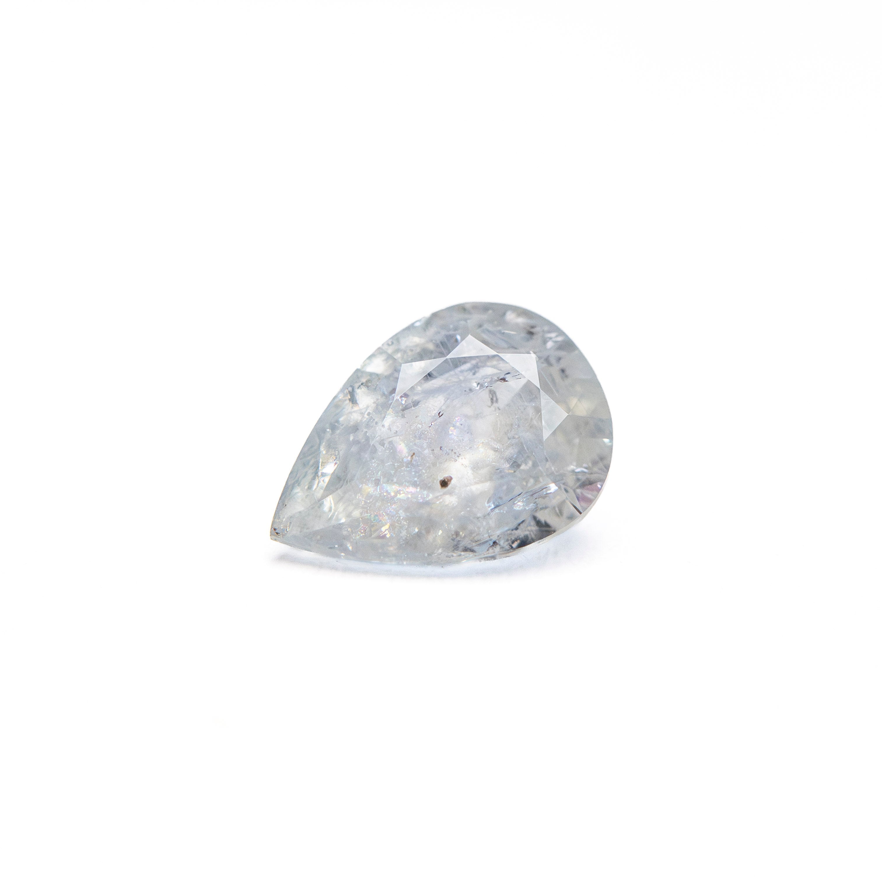 0.76ct 6.97x5.07x3.07mm Pear Brilliant Sapphire 26150-04 - Lelya - bespoke engagement and wedding rings made in Scotland, UK