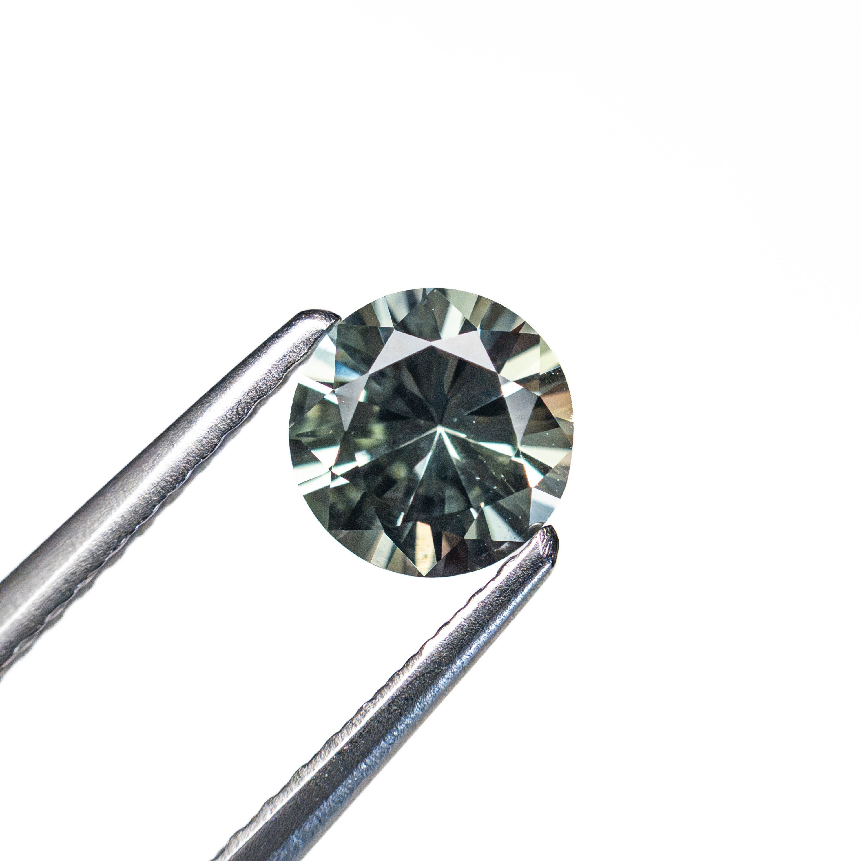 0.77ct 5.47x5.53x3.56mm Round Brilliant Sapphire 26134-11 - Lelya - bespoke engagement and wedding rings made in Scotland, UK