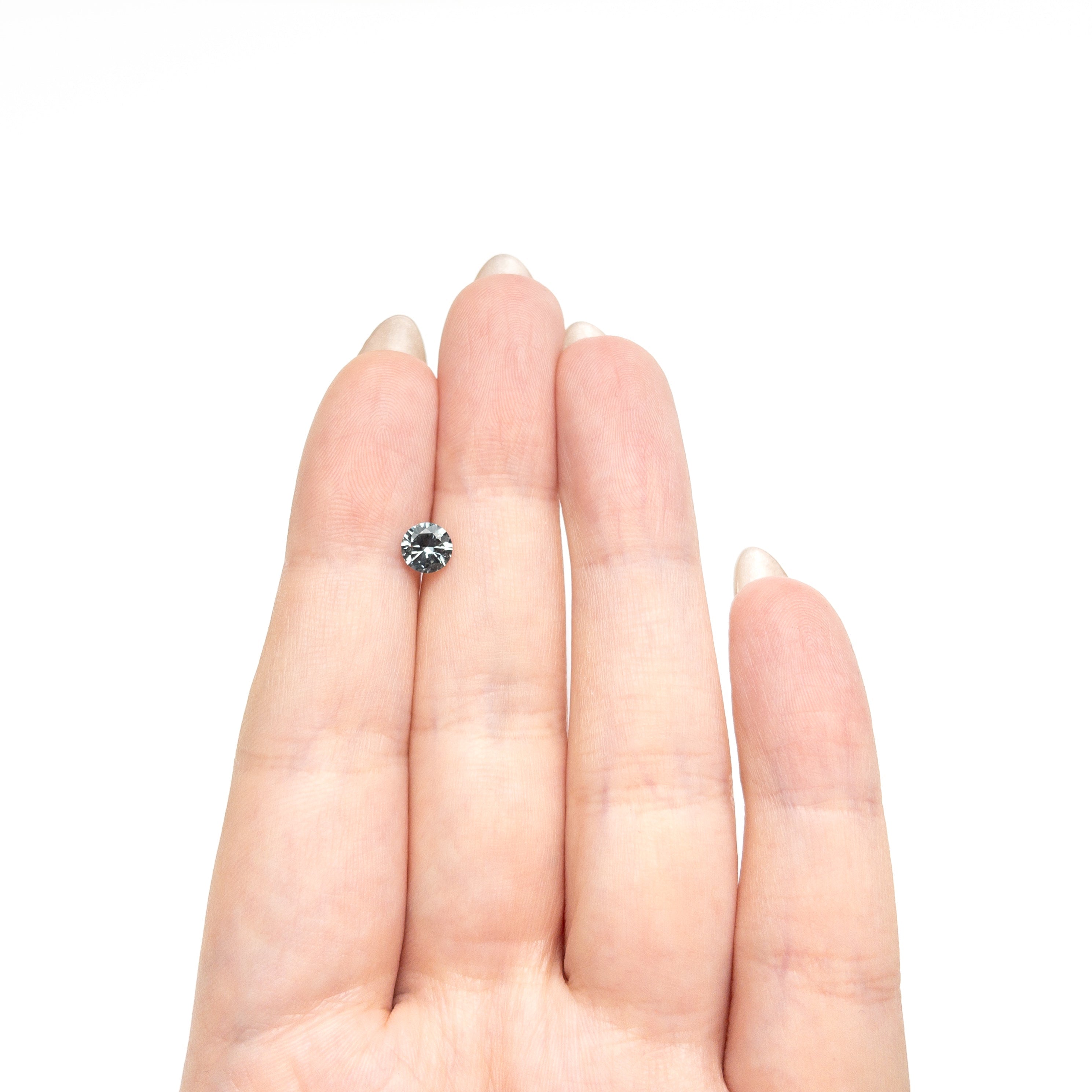 0.77ct 5.53x5.50x3.33mm Round Brilliant Sapphire 26134-22 - Lelya - bespoke engagement and wedding rings made in Scotland, UK