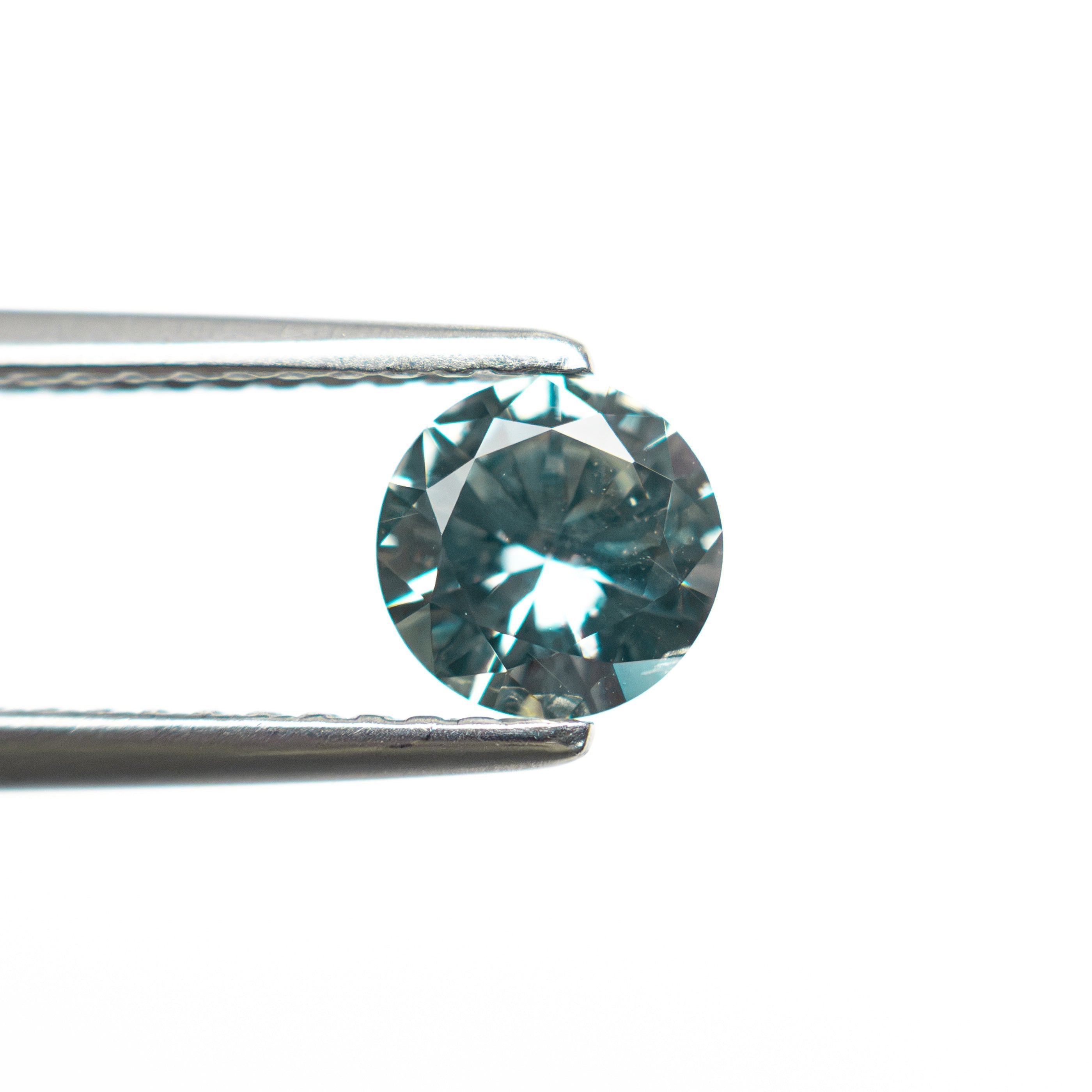 0.77ct 5.53x5.50x3.33mm Round Brilliant Sapphire 26134-22 - Lelya - bespoke engagement and wedding rings made in Scotland, UK