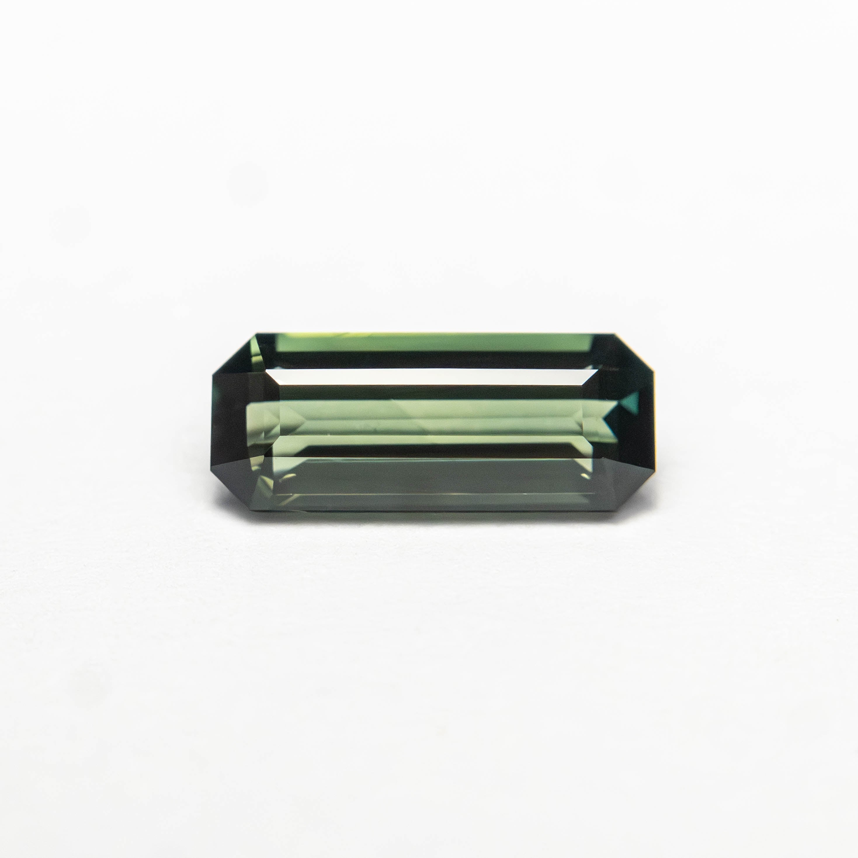 0.77ct 8.35x3.41x2.50mm Cut Corner Rectangle Step Cut Sapphire 27336 - 58 - Lelya - bespoke engagement and wedding rings made in Scotland, UK
