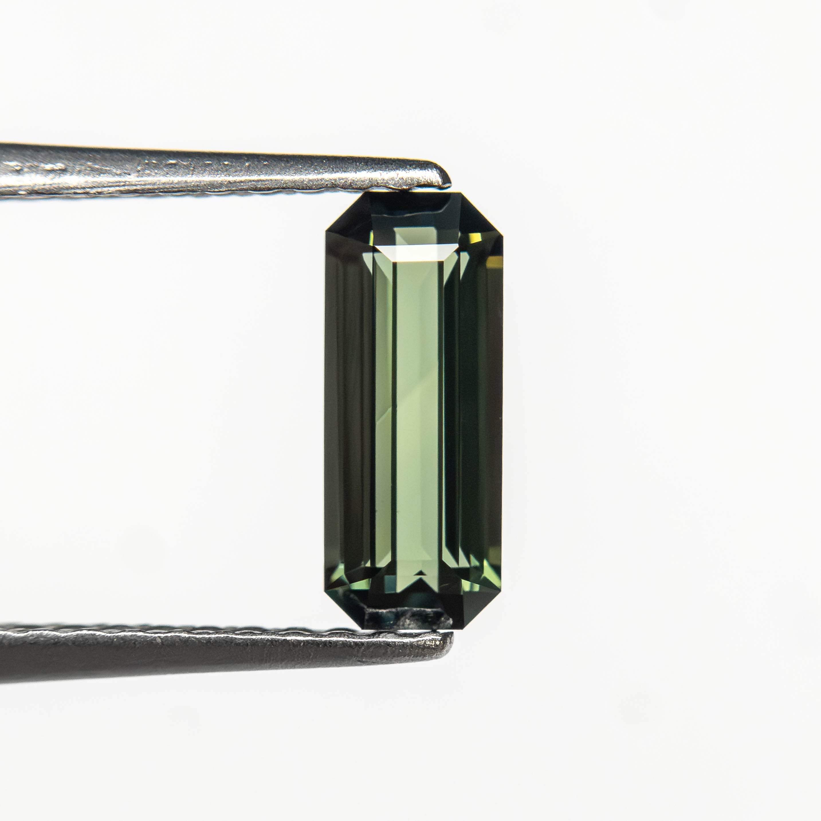 0.77ct 8.35x3.41x2.50mm Cut Corner Rectangle Step Cut Sapphire 27336 - 58 - Lelya - bespoke engagement and wedding rings made in Scotland, UK
