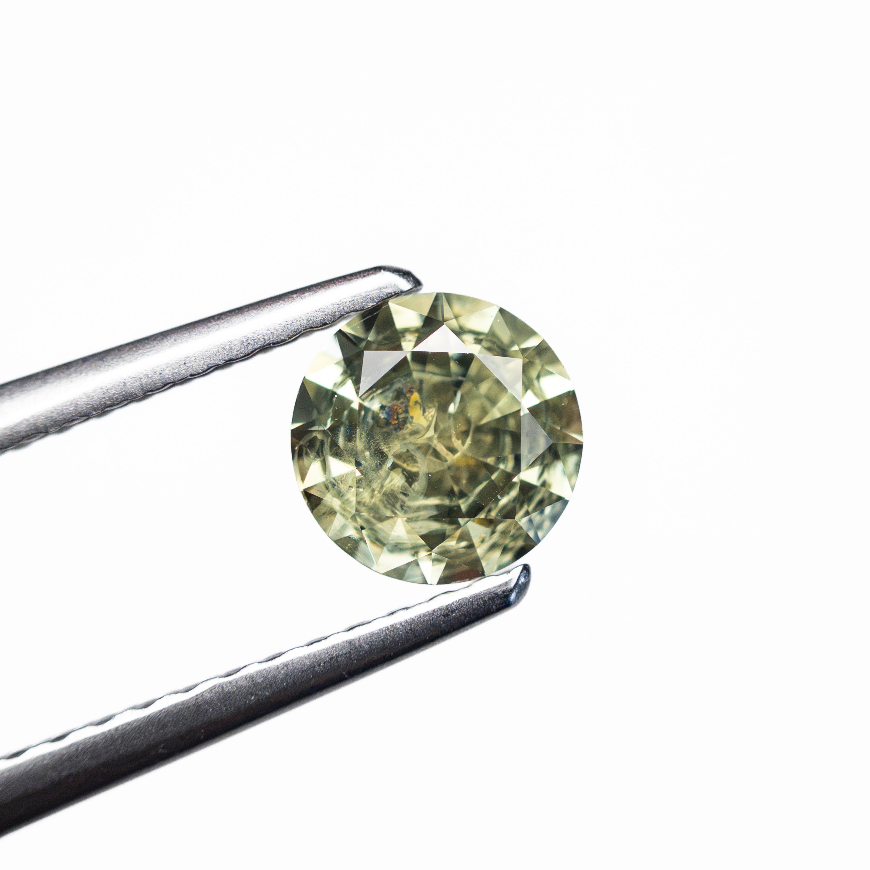 0.78ct 5.57x5.57x3.58mm Round Brilliant Sapphire 26134-12 - Lelya - bespoke engagement and wedding rings made in Scotland, UK