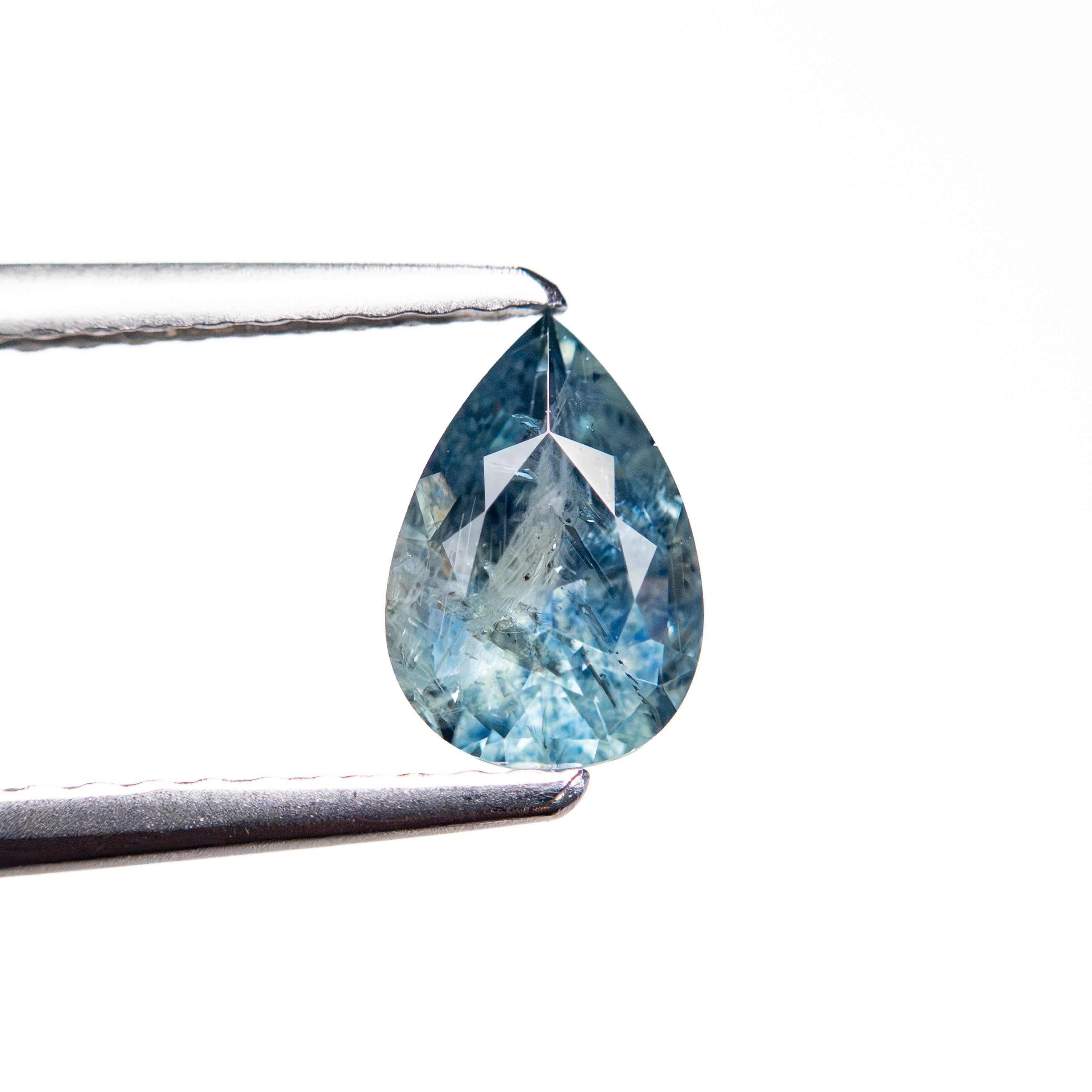 0.79ct 7.05x4.84x3.35mm Pear Brilliant Sapphire 26150-06 - Lelya - bespoke engagement and wedding rings made in Scotland, UK