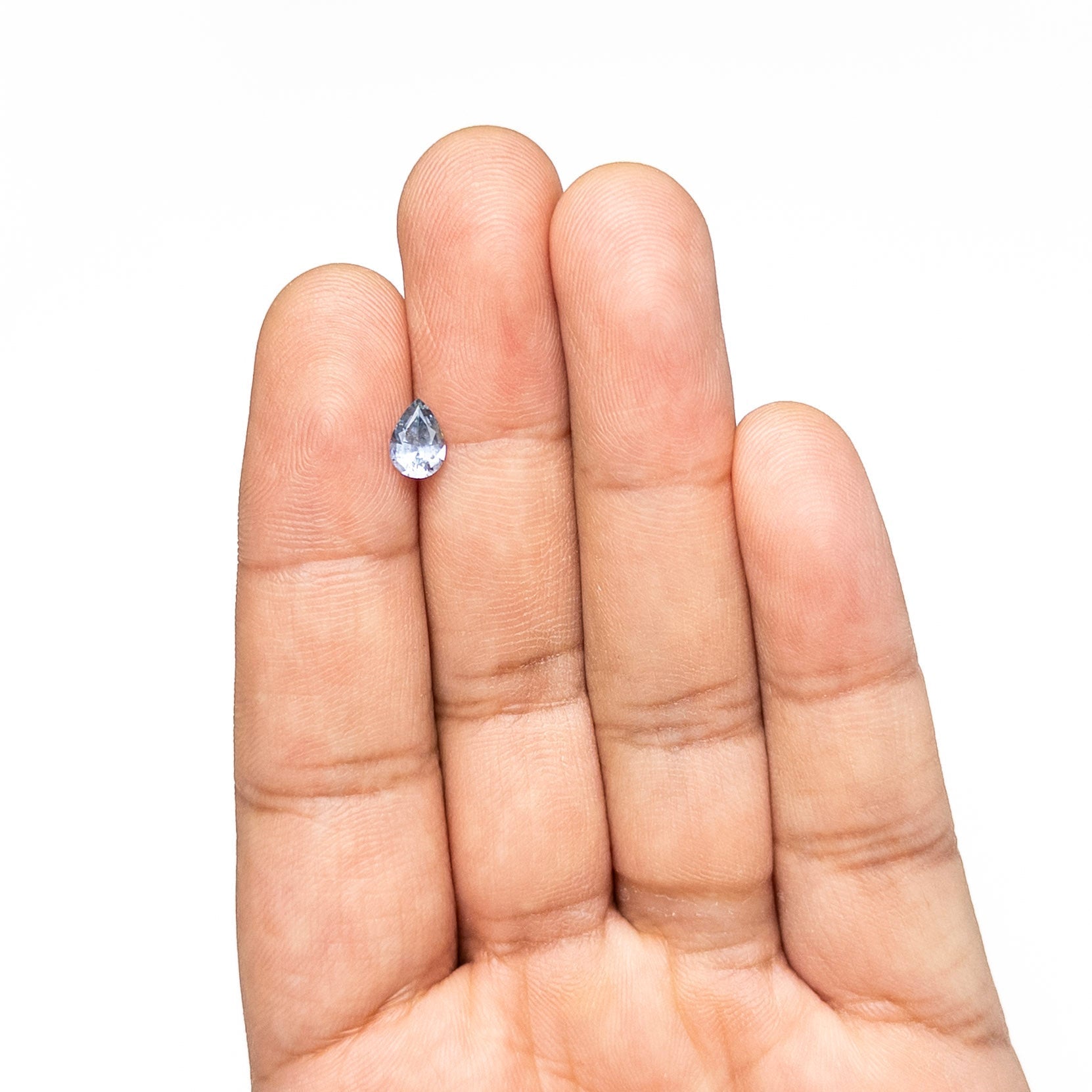 0.79ct 7.08x4.99x3.10mm Pear Brilliant Sapphire 26150-16 - Lelya - bespoke engagement and wedding rings made in Scotland, UK