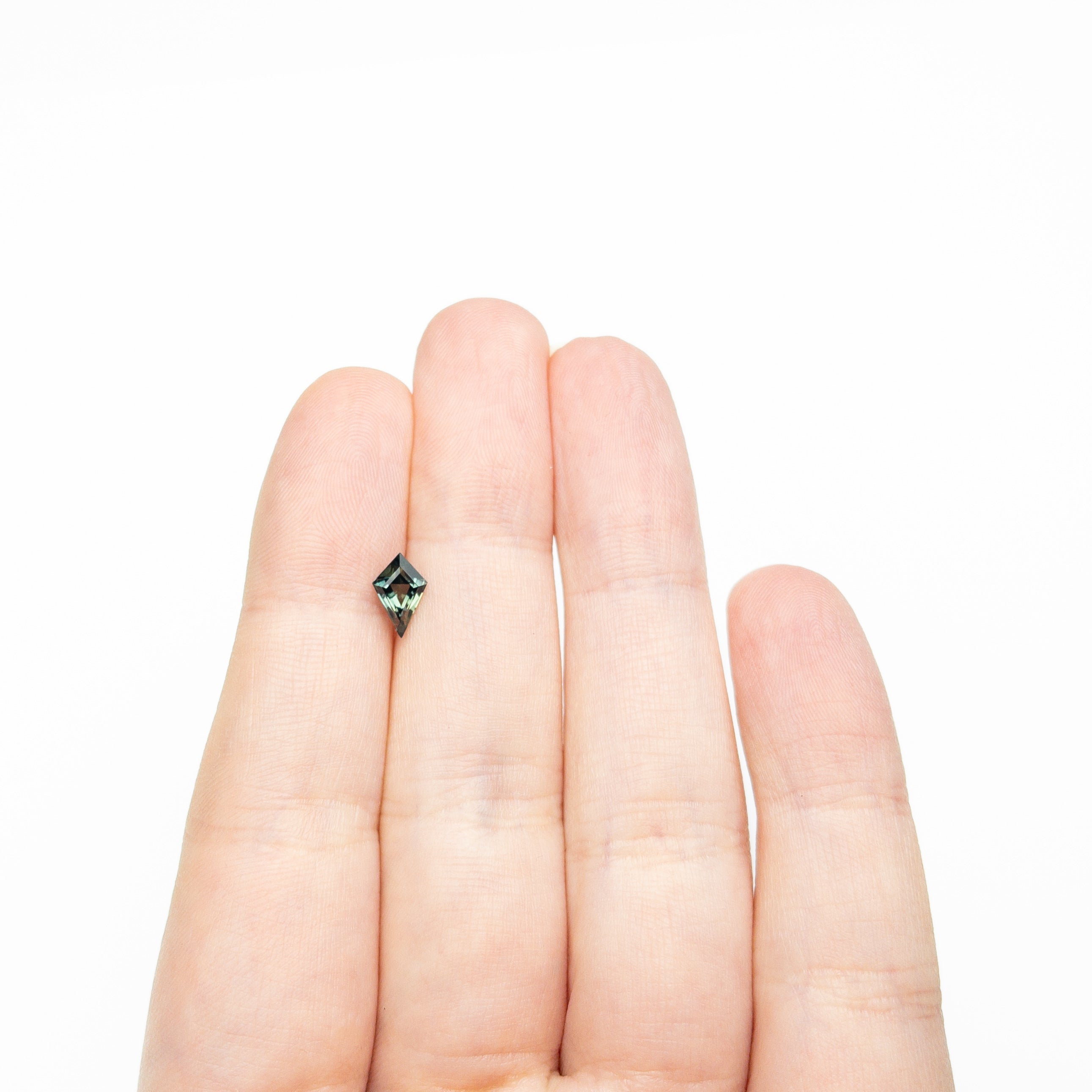 0.79ct 8.27x4.78x3.40mm Kite Step Cut Sapphire 27336 - 26 - Lelya - bespoke engagement and wedding rings made in Scotland, UK